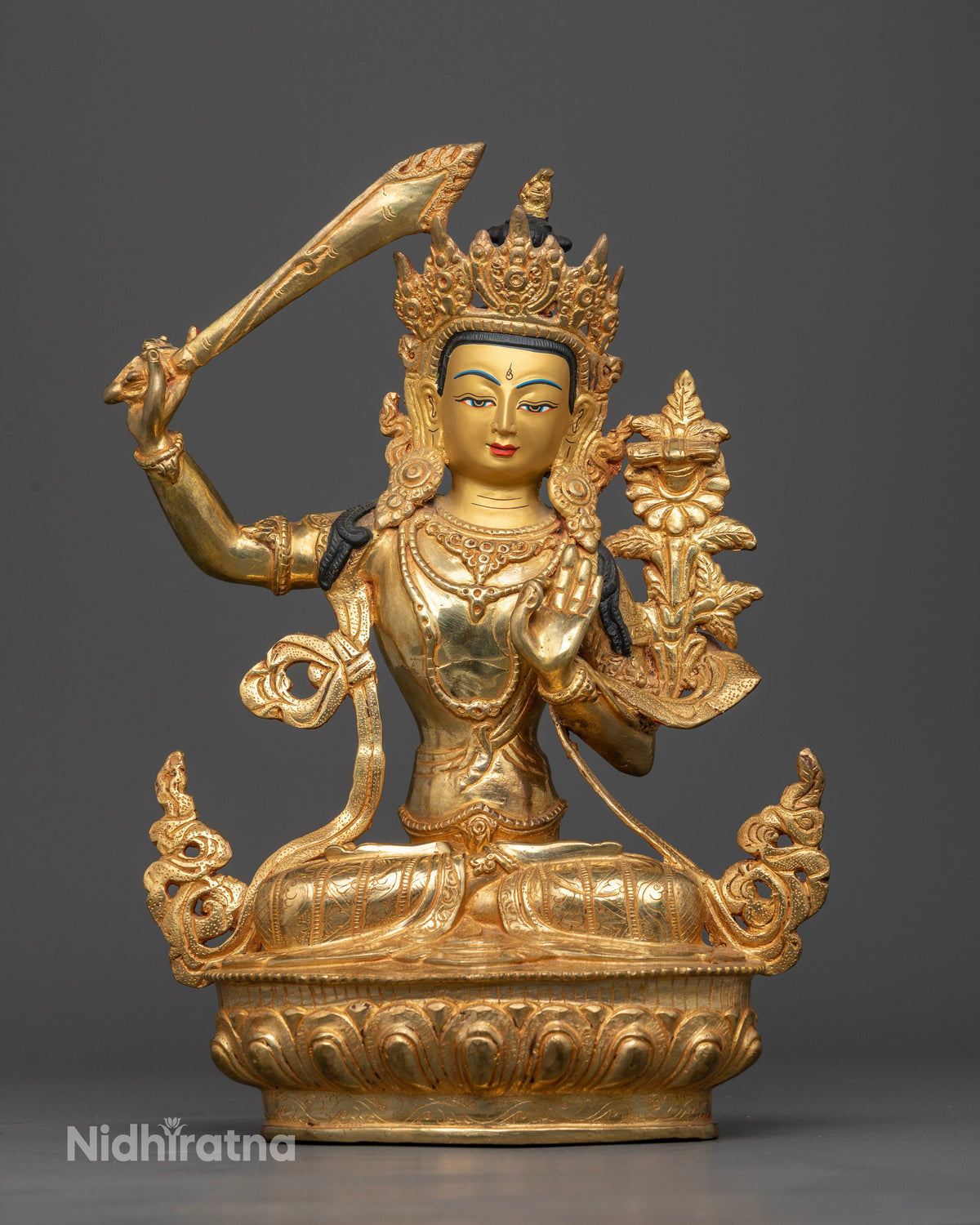 Gold fire gilded Manjushri Buddhist Statue with flaming wisdom sword.