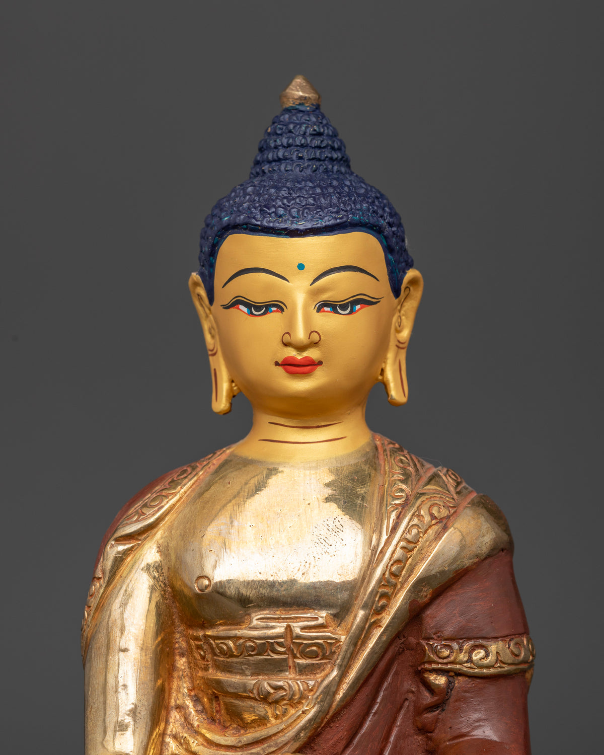 Gold fire gilded shakyamuni buddha statue with 24k gold face.