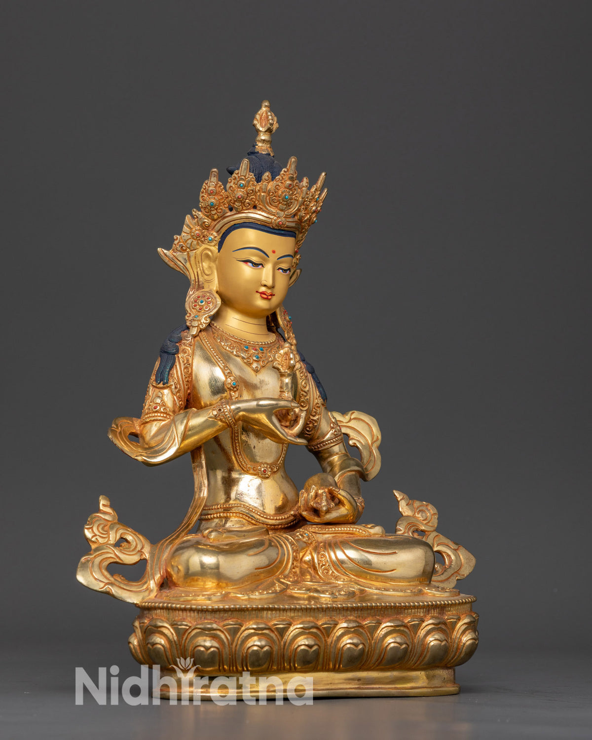 Gold gilded copper Vajrasattva statue with intricate Newari craftsmanship and ornamental details