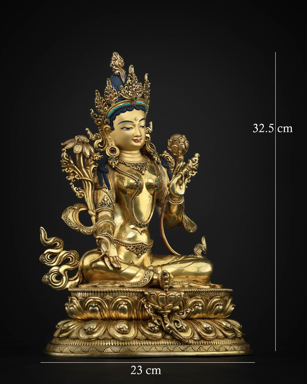 Gold gilded Green Tara Buddhist statue seated in Lalitasana on a lotus pedestal