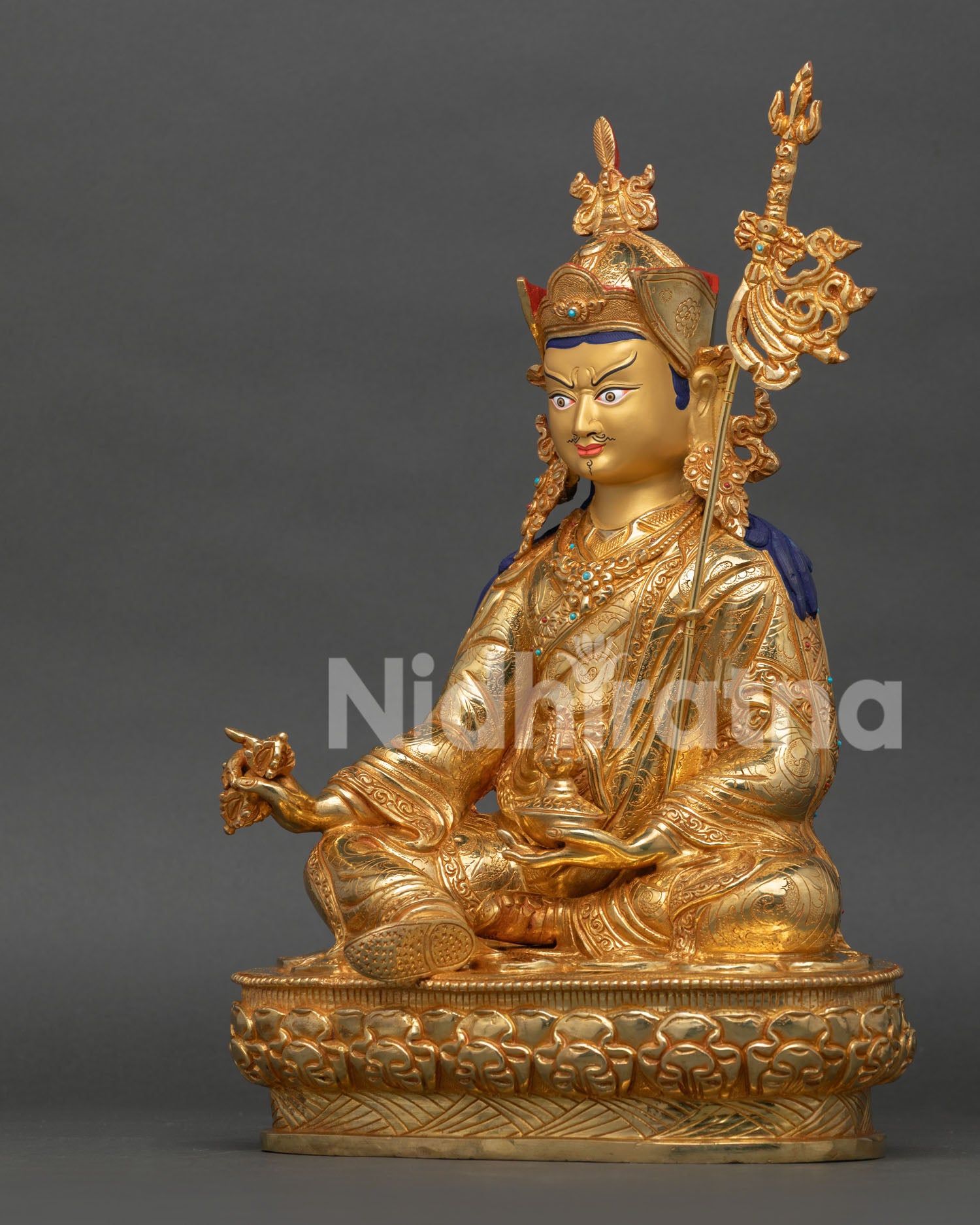 gold gilded guru padmasambhava statue with copper body and meditation altar artwork