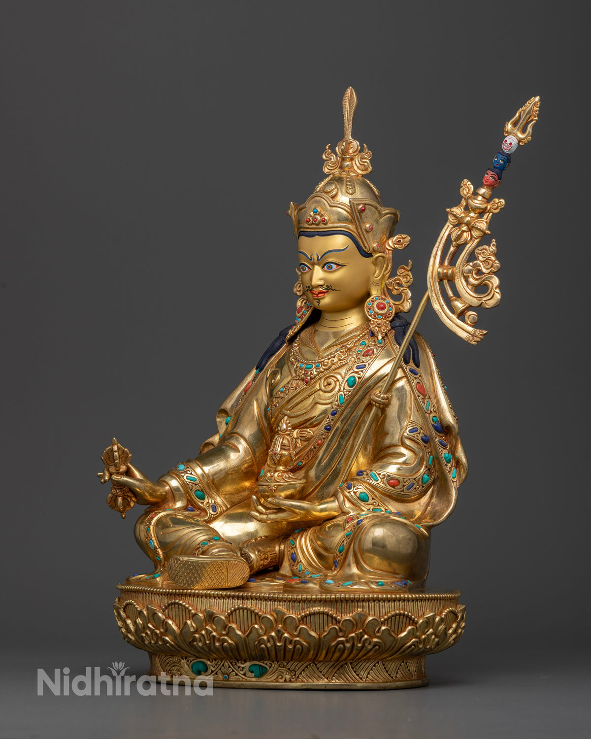 Gold-gilded Guru Rinpoche statue with hand-carved royal garments and lotus throne