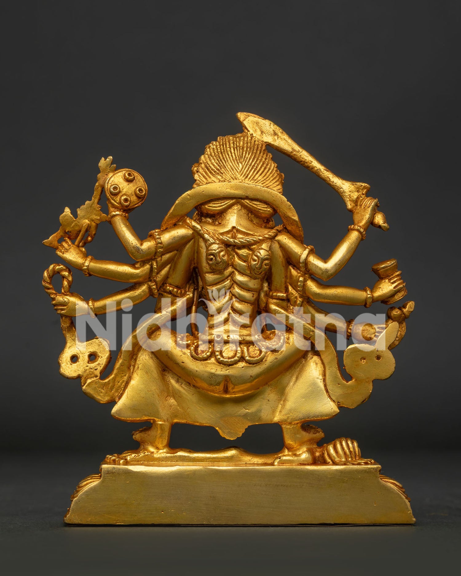 Gold gilded Nyatabhulu Ajima statue with raised sword and sacred tantric ornaments