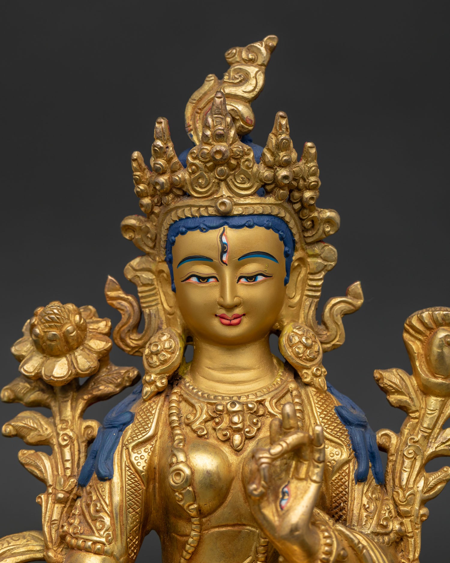 Gold Painted Face of White Tara Statue with Seven All Seeing Eyes.