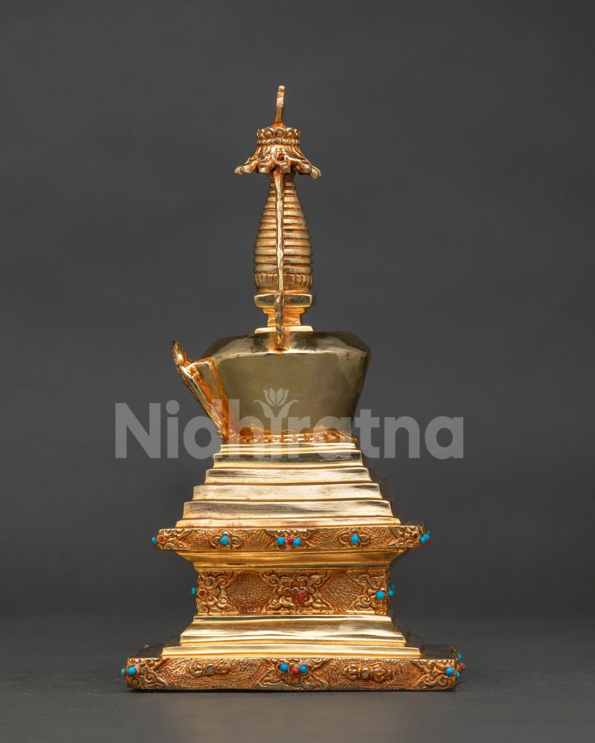 Gold-plated Buddha Shakyamuni Stupa adorned with semi-precious stones