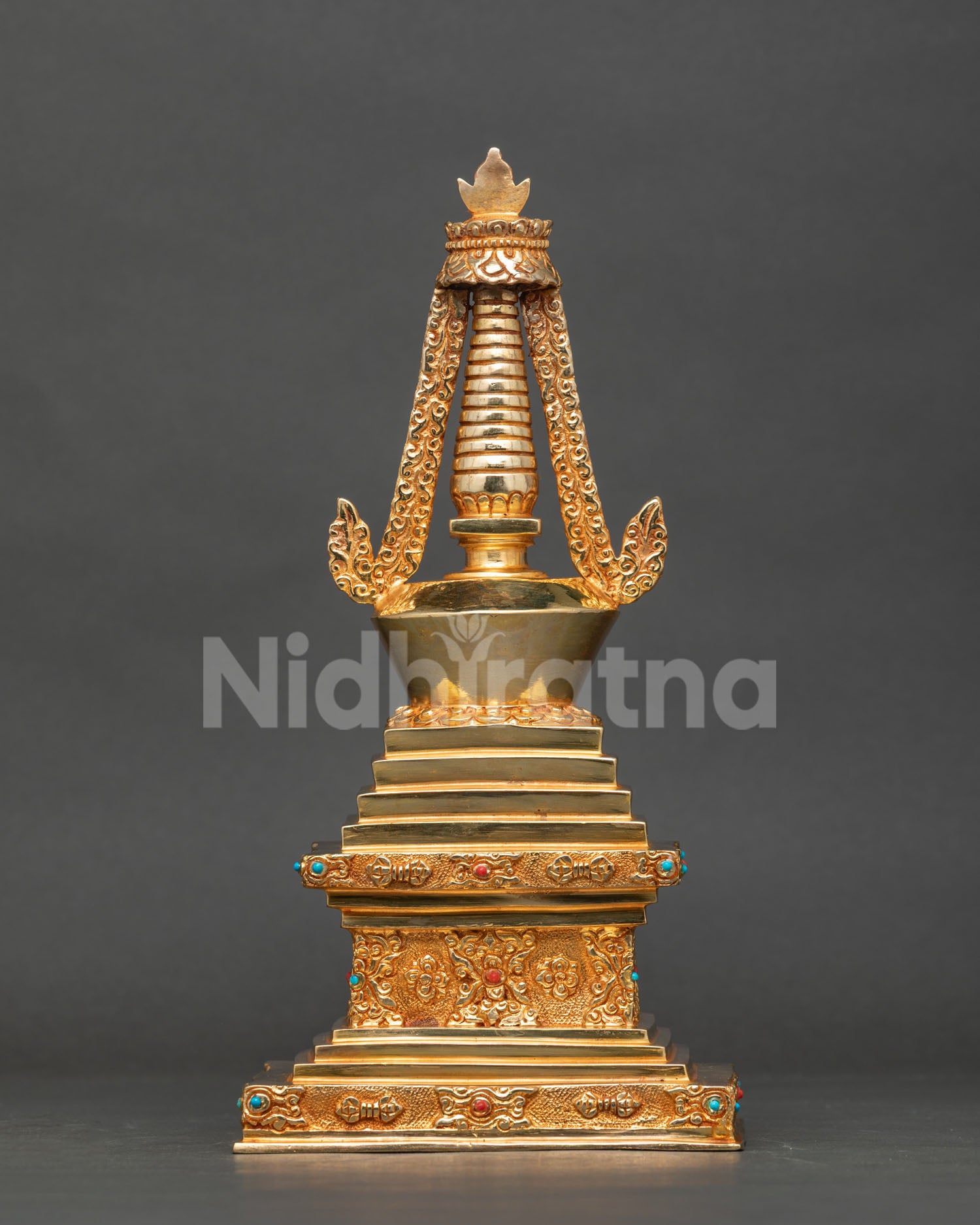 Gold-plated Buddhist Stupa crafted from copper with semi-precious stones