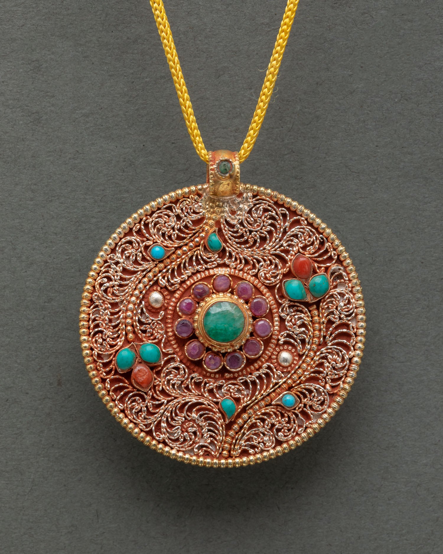 Gold-plated Flower Locket from Nepal symbolizing growth, renewal, and spiritual blossoming
