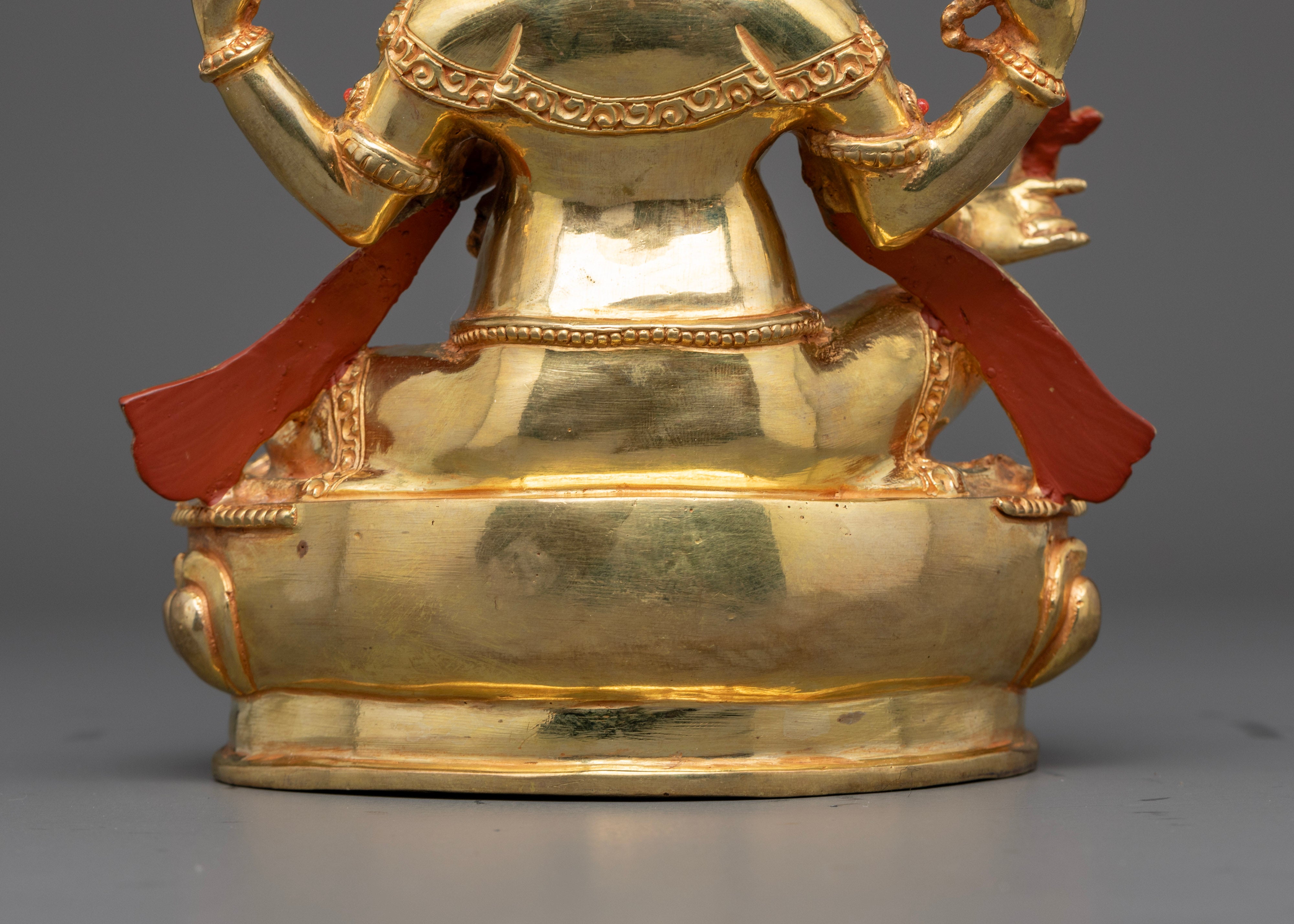 golden ganesh statue back