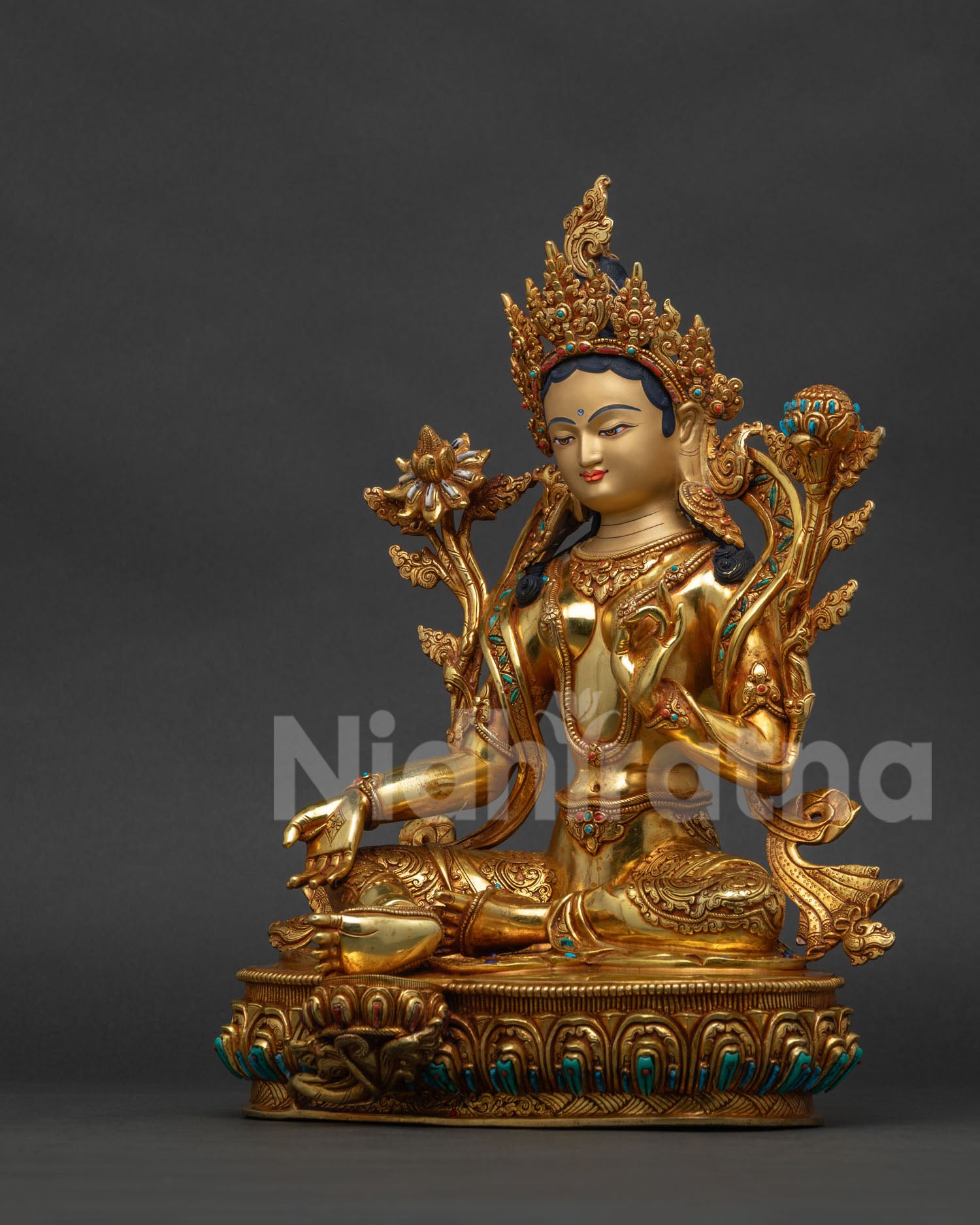 Green Tara Bodhisattva statue left side view celestial ornaments blessing mudra copper Nepal