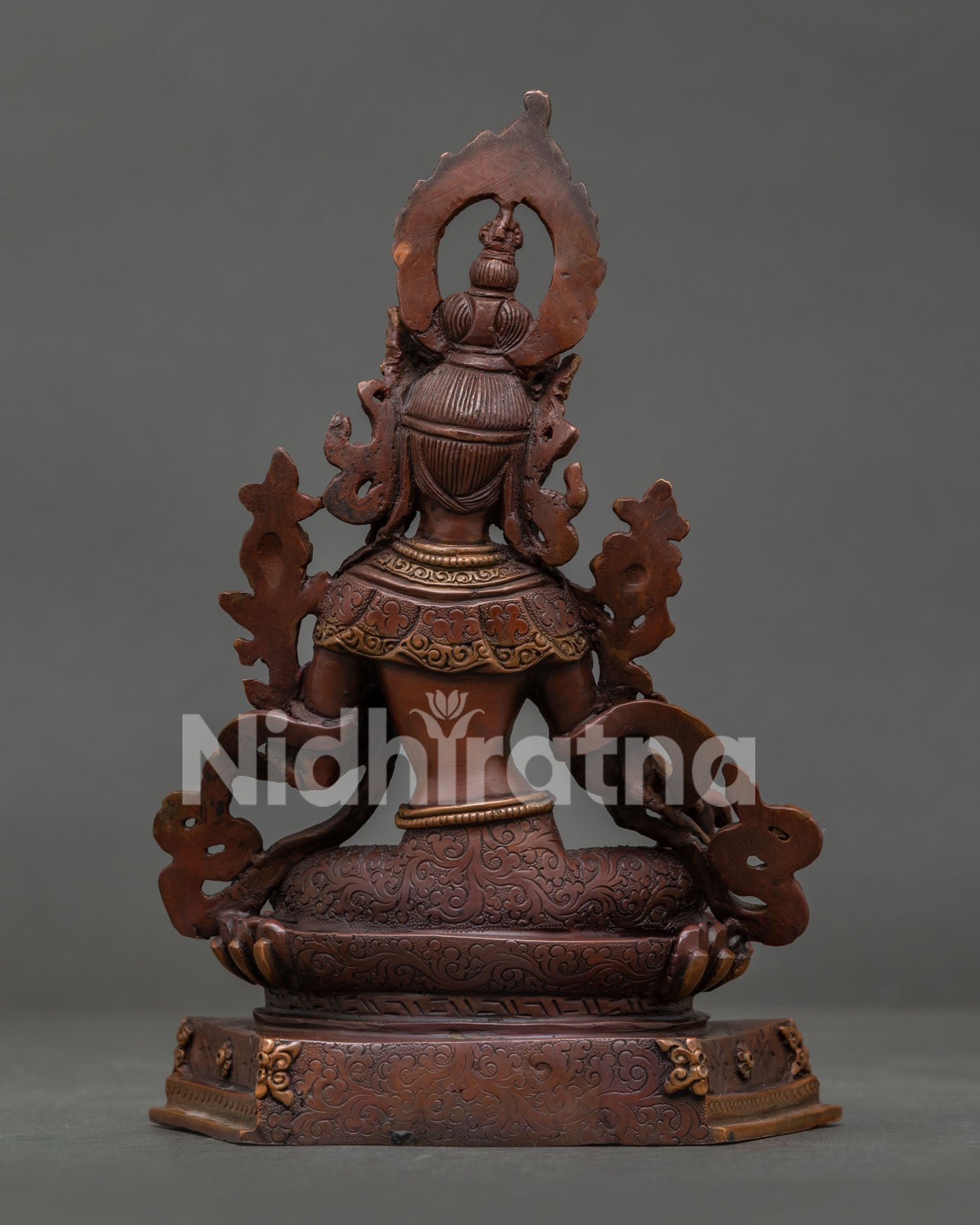 Green Tara Buddhist statue showcasing traditional Nepalese metal sculpture.