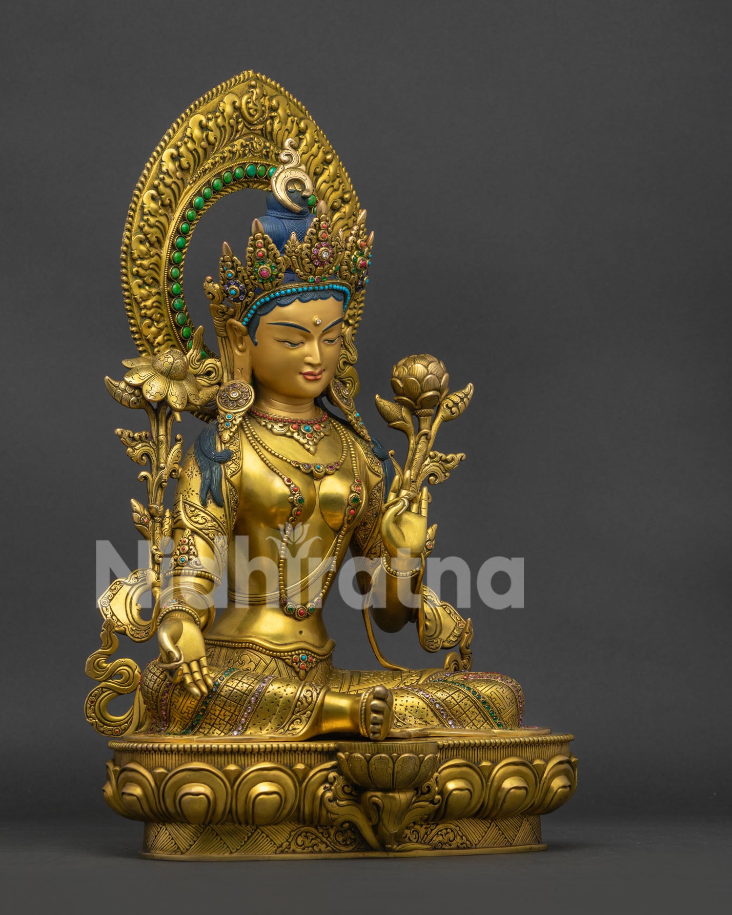 Green Tara right side: graceful posture, repoussé work, 24K gold-gilded copper statue
