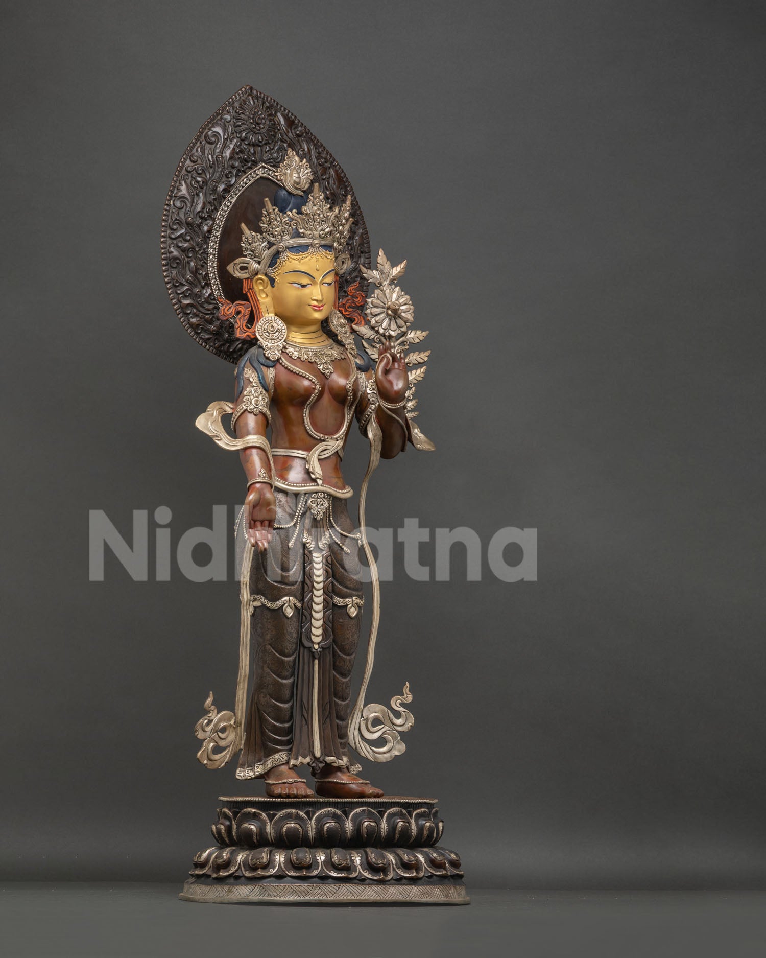Green Tara right side showing utpala lotus—handmade oxidized copper Buddhist sculpture detail