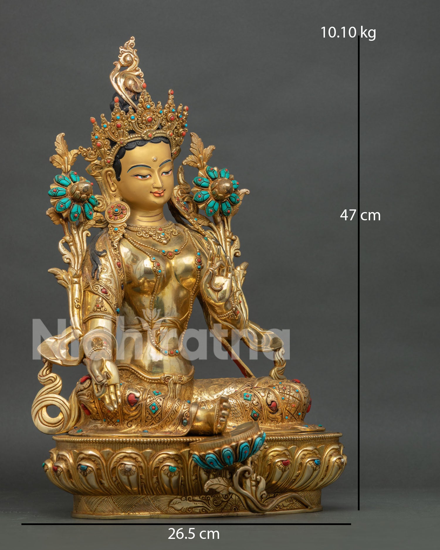 Green Tara sculpture with lotus throne and detailed Himalayan craftsmanship