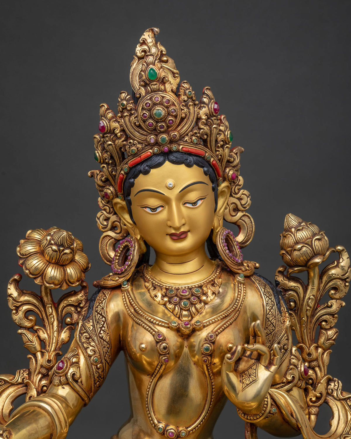 Green Tara Statue close-up of gold-gilded jewelry, crown and lotus stem detail