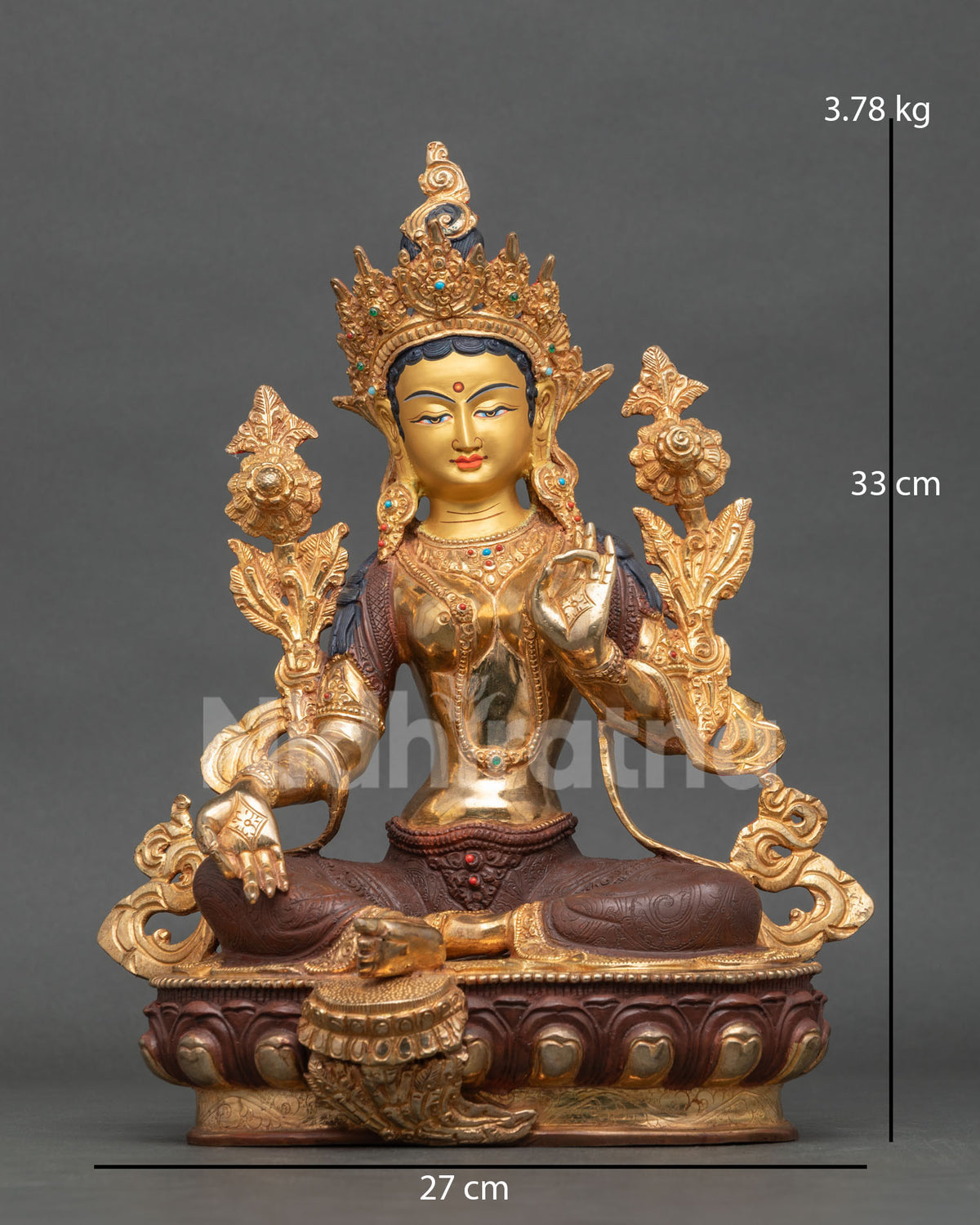 Green Tara statue front view half oxidized gold fire gilded Patan Nepal.