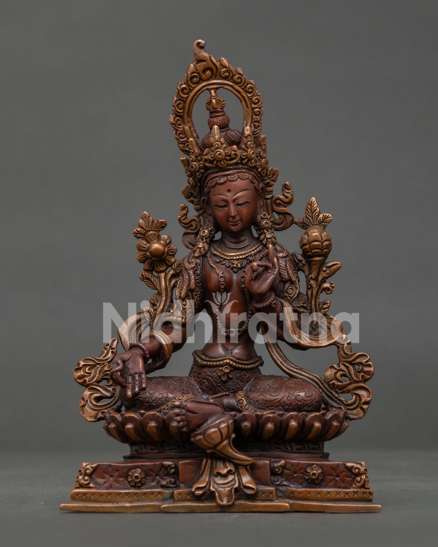 Green Tara statue handcrafted by Newari artisans in Patan Nepal oxidized copper.