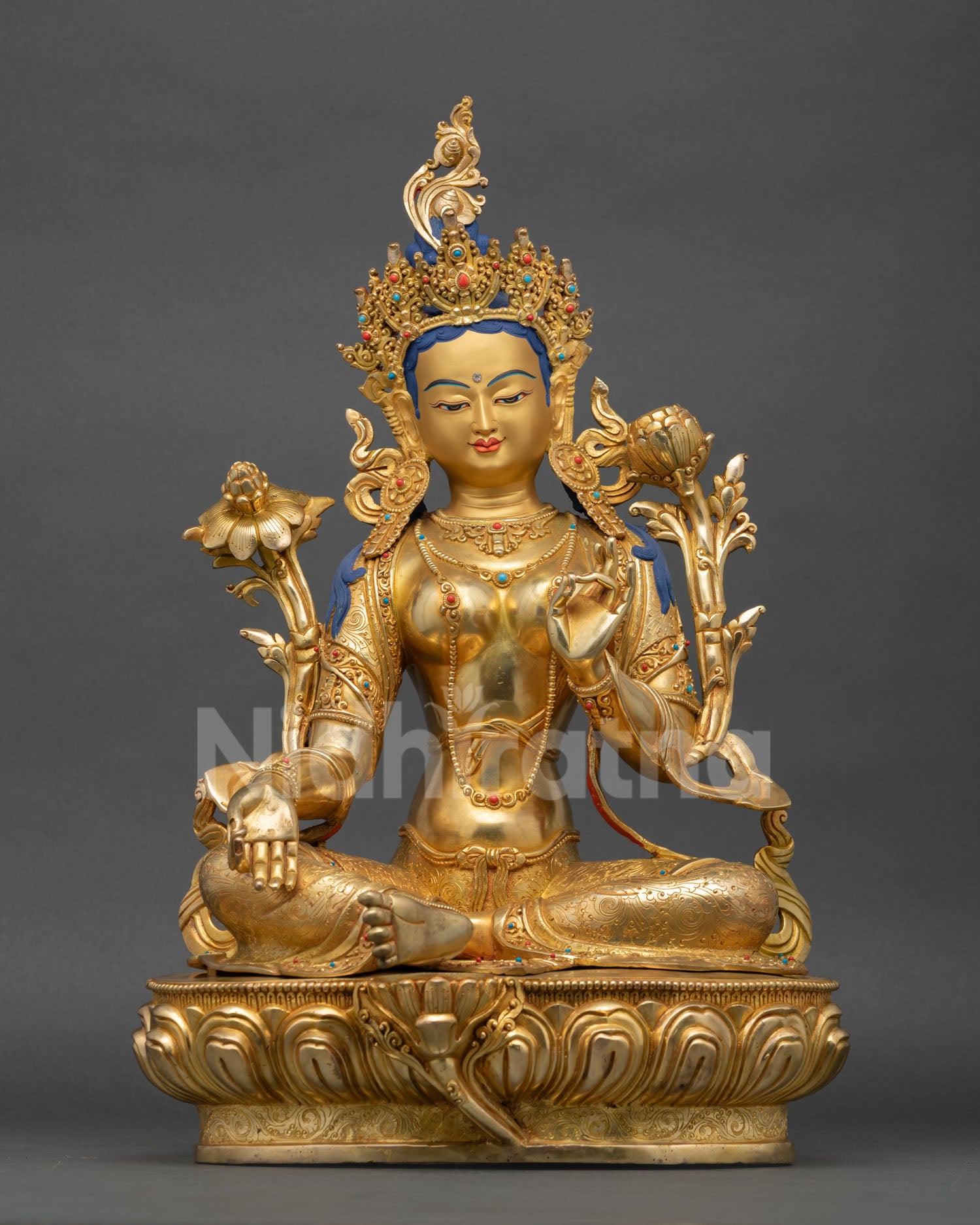 Green Tara statue handcrafted in Nepal with gold fire-gilded copper lotus throne
