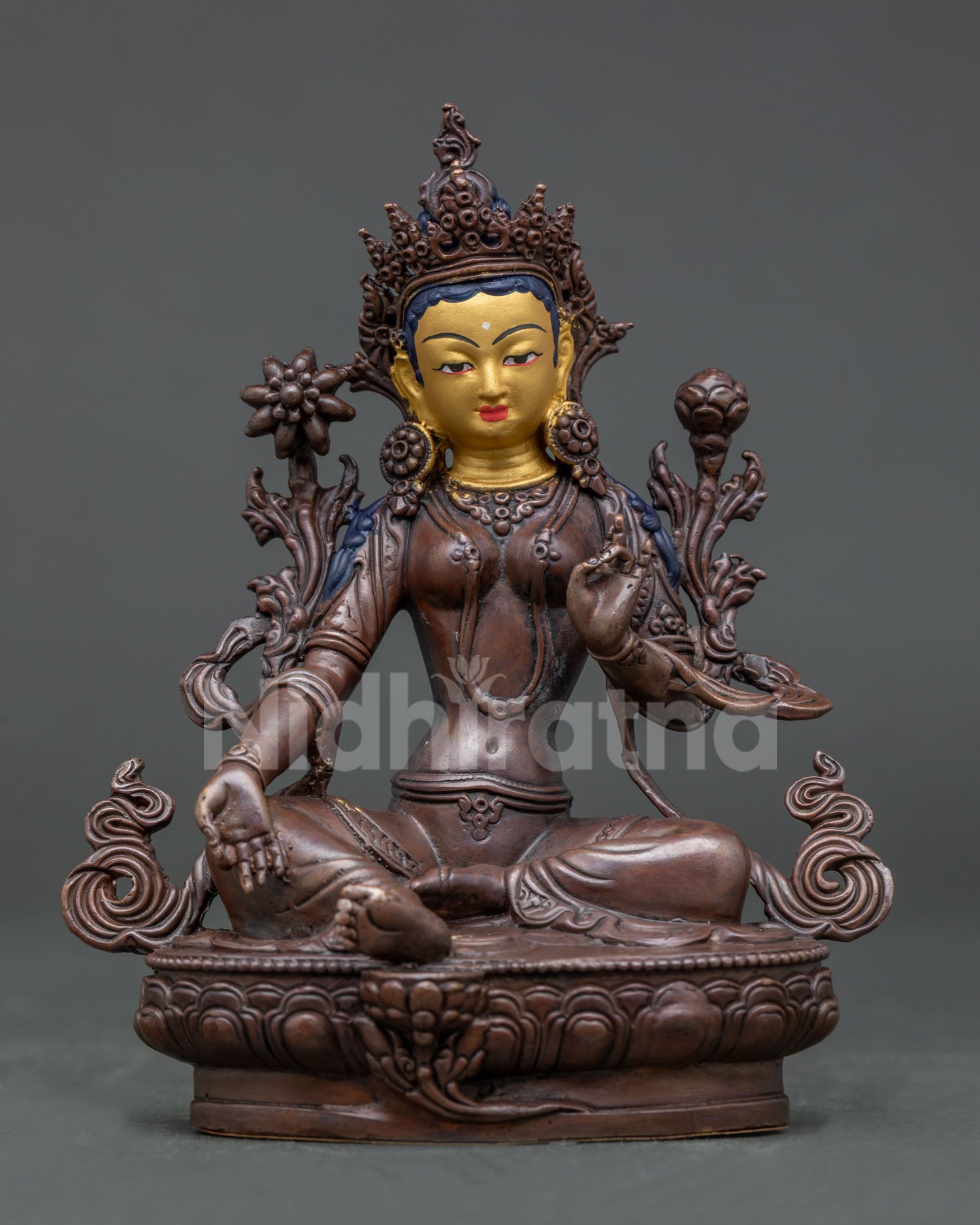 Green Tara Statue handcrafted in Patan Nepal with copper body oxidized finish and 24K gold painted face.