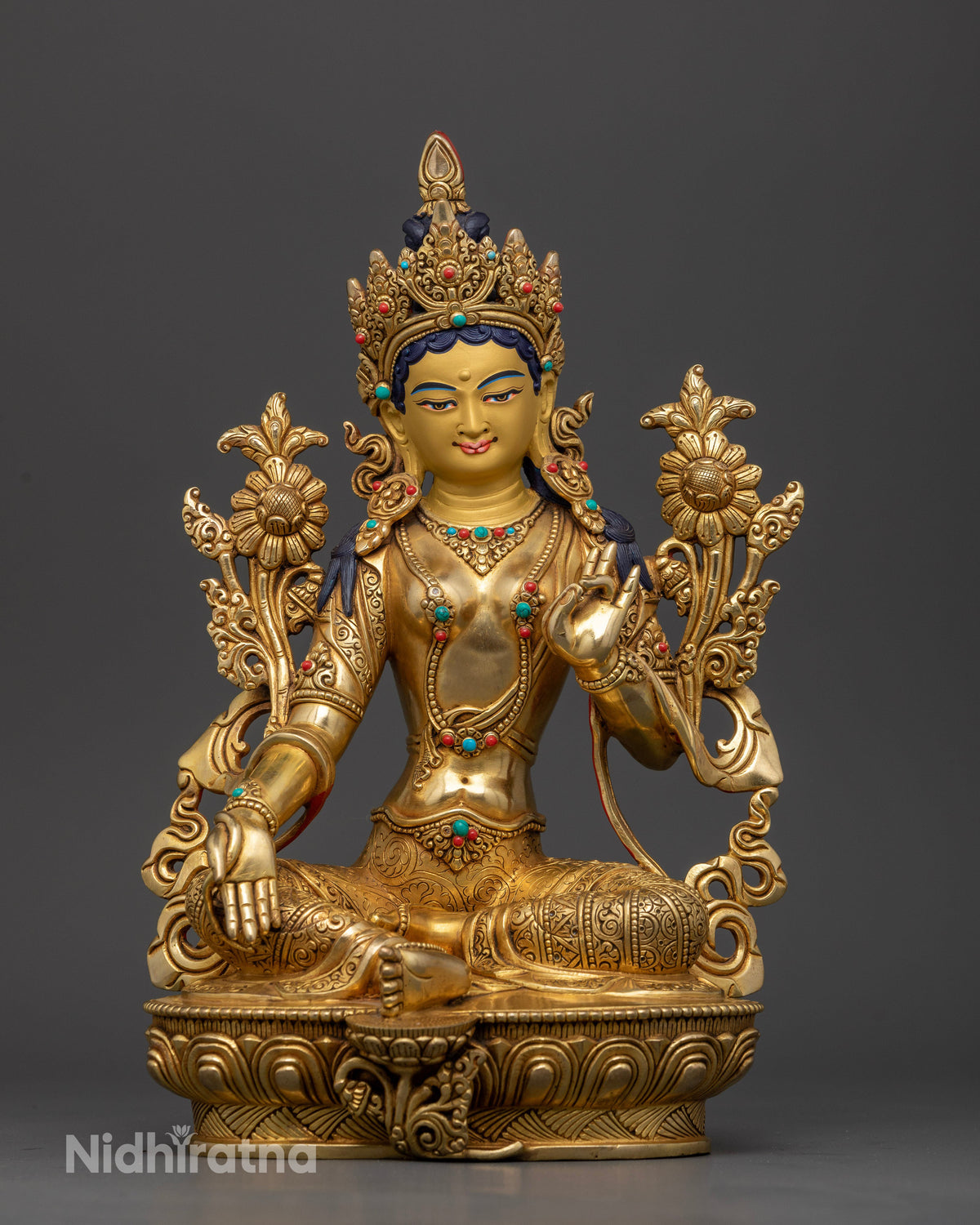 Green Tara statue handcrafted Newari artist Patan Nepal copper gold fire gilded 24K gold painted face.