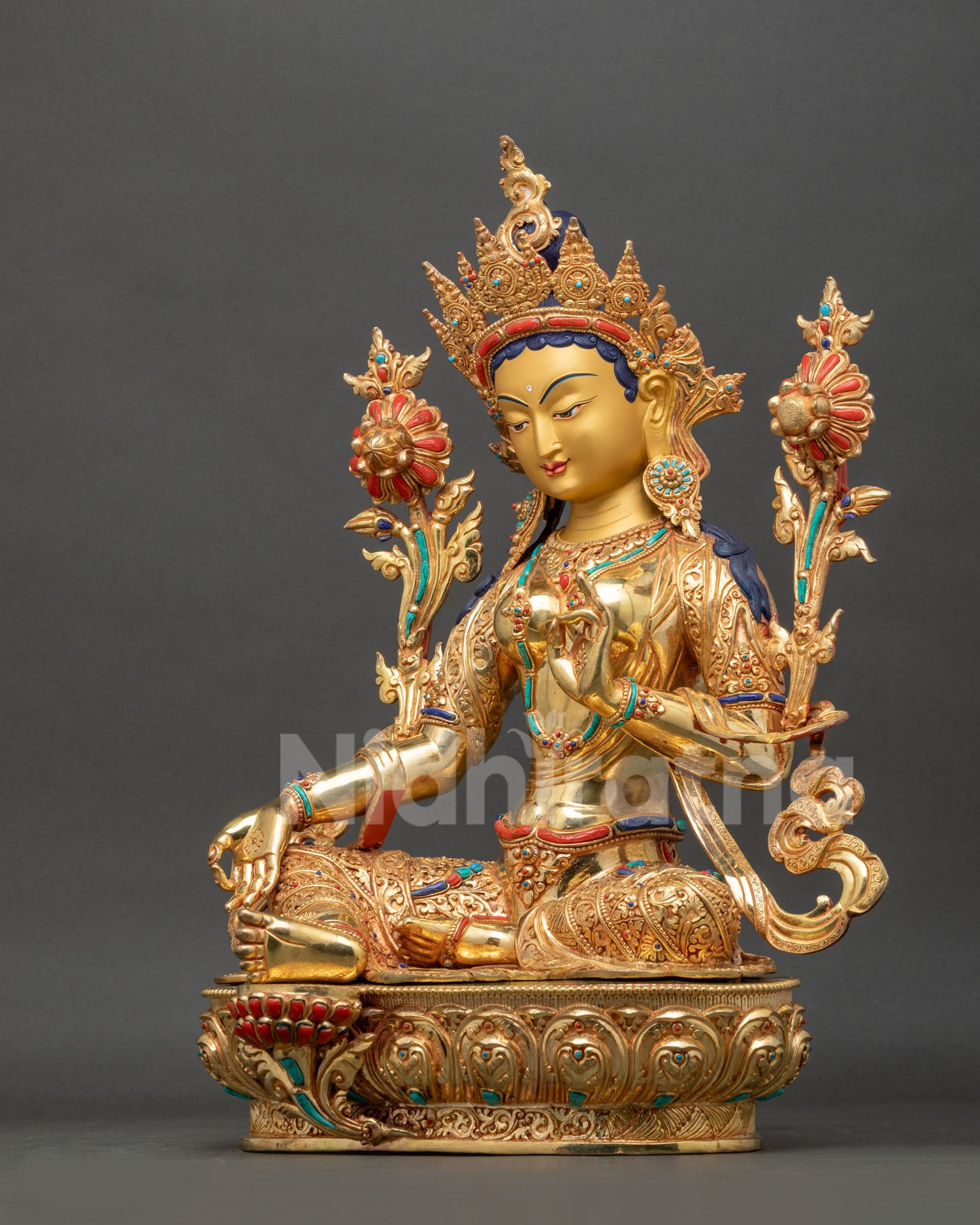Green Tara Statue left side view, gold fire-gilded copper detailing