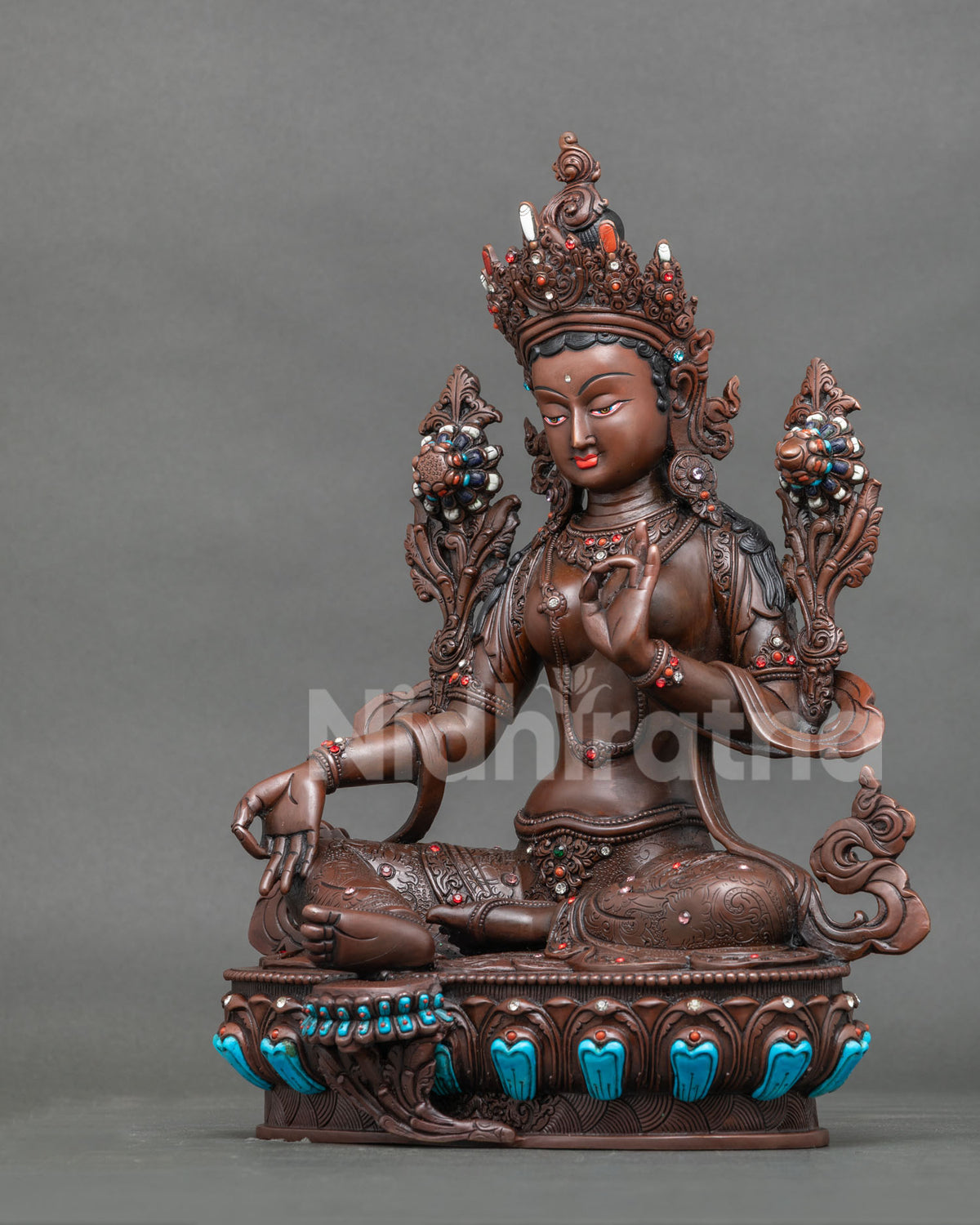 Green Tara Statue left side view hand carved floral motifs copper sculpture.