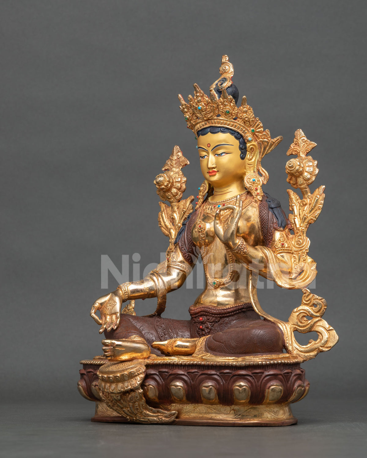 Green Tara statue left side view semi precious stones jewel crown.