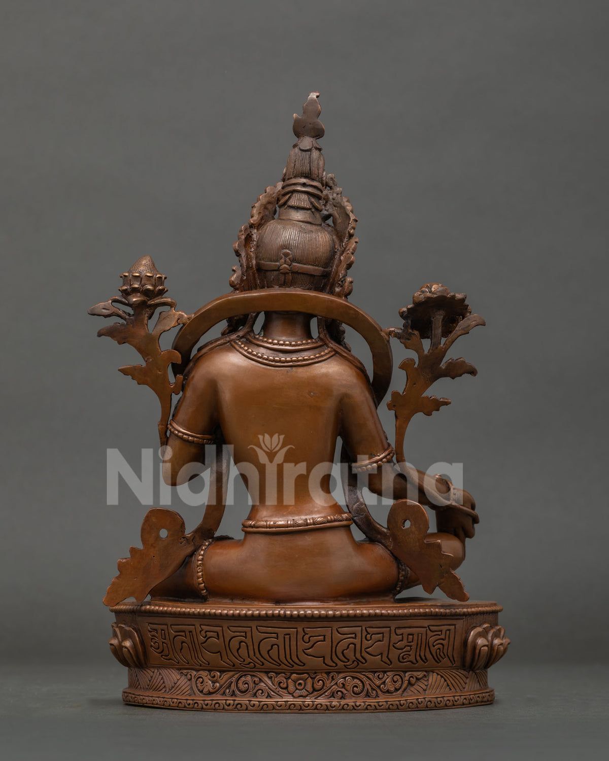 Green Tara Statue oxidized copper, back view of lotus pedestal and robe detail