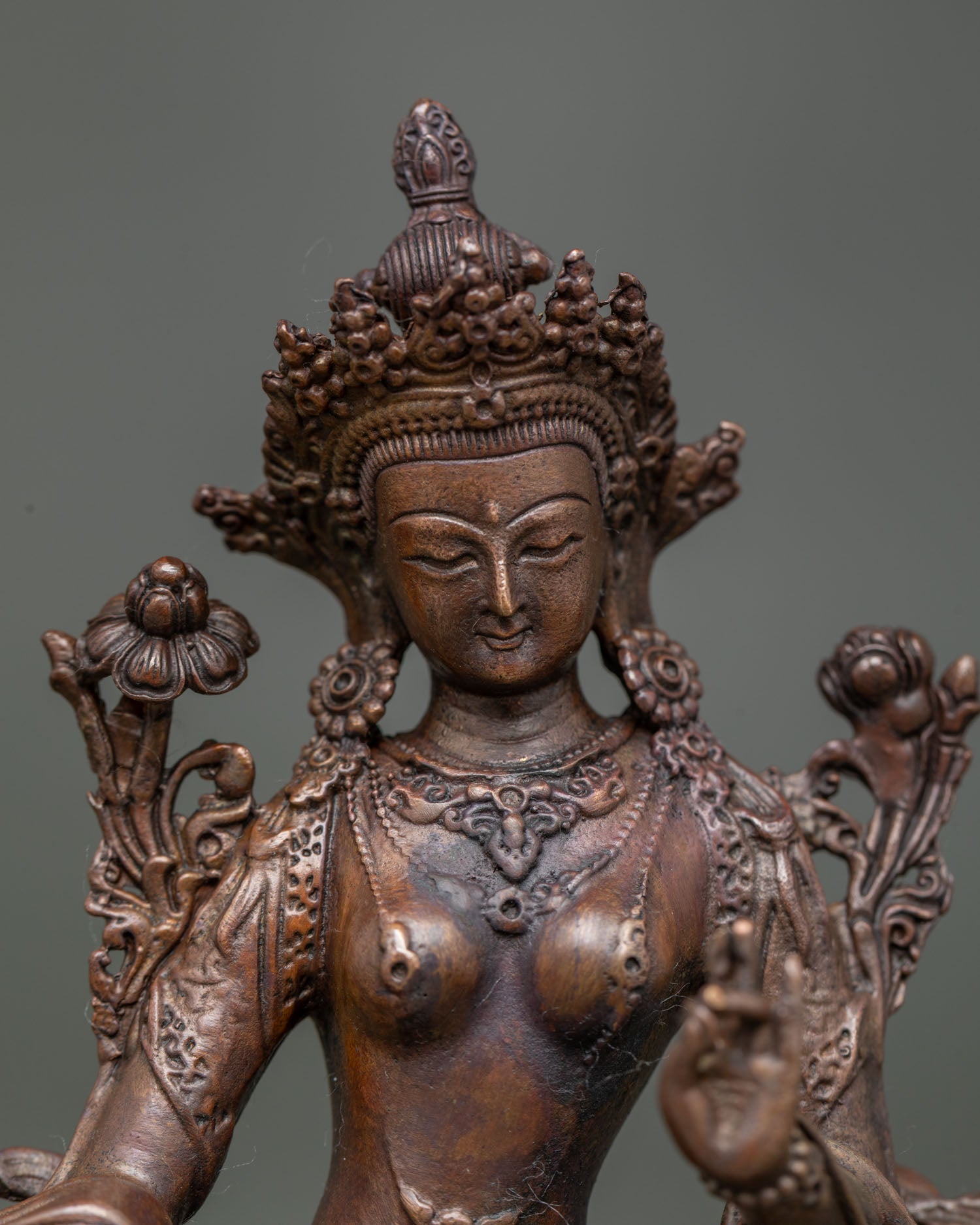 Green Tara Statue showing compassionate face and intricate Nepalese Buddhist craftsmanship.