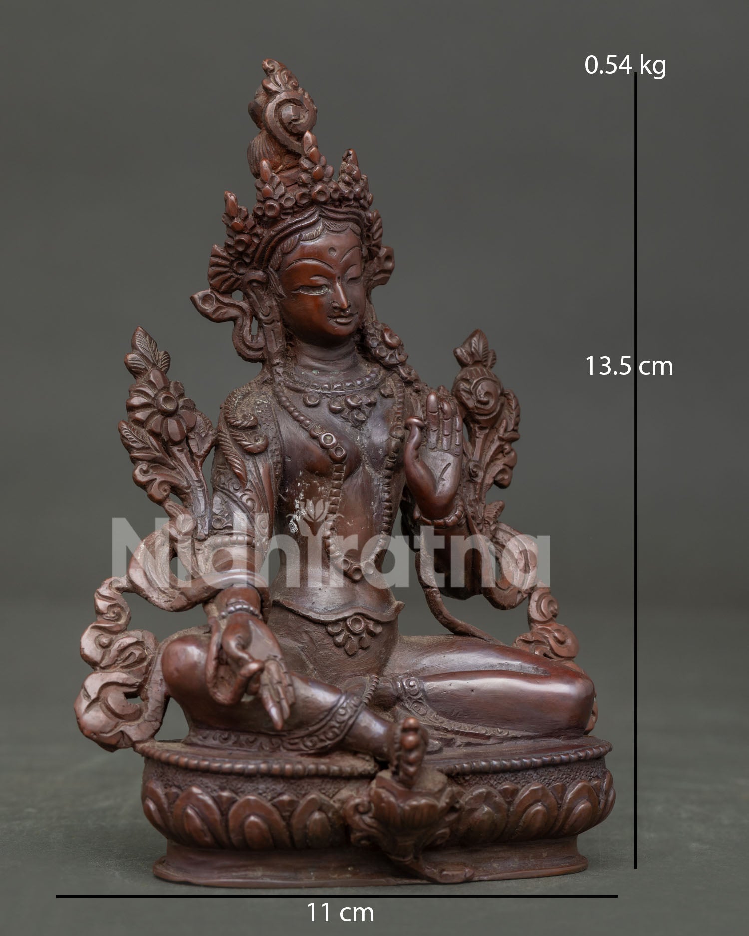 Green Tara Statue with blue utpala lotus and intricate Newari craftsmanship.