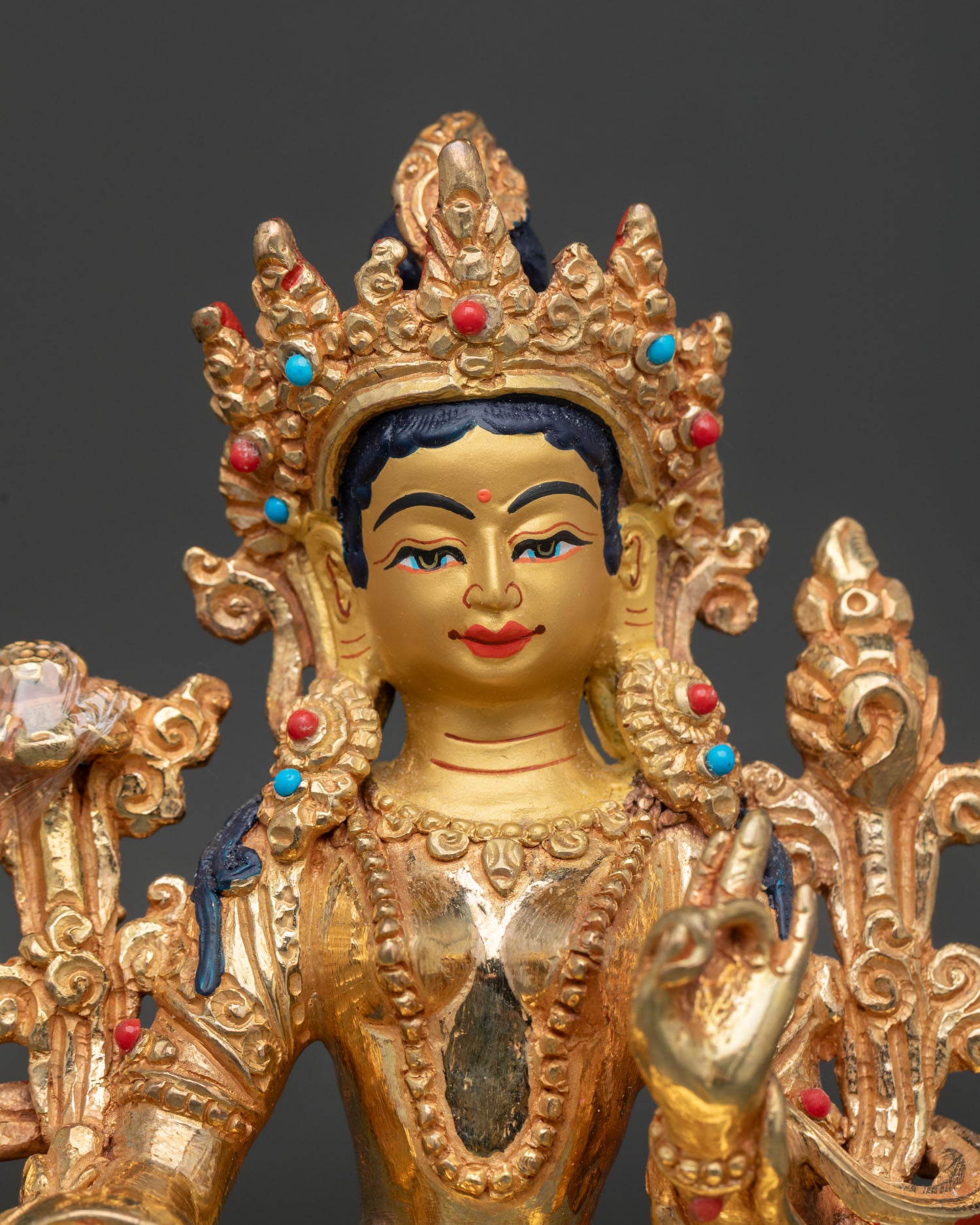 Green Tara Statue with Gold Painted Face and Compassionate Expression
