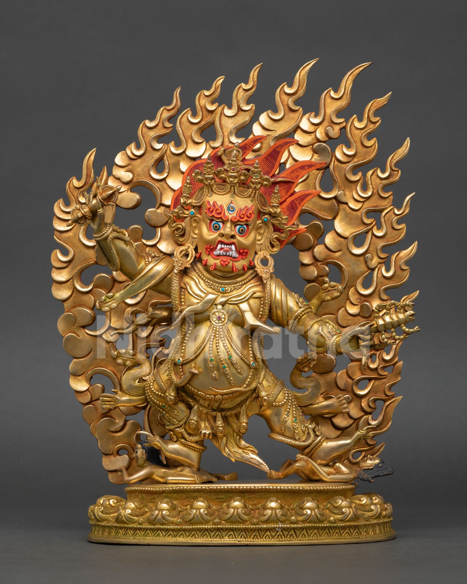 Guru Dragpo statue with 24K gold gilding and flaming halo on lotus pedestal