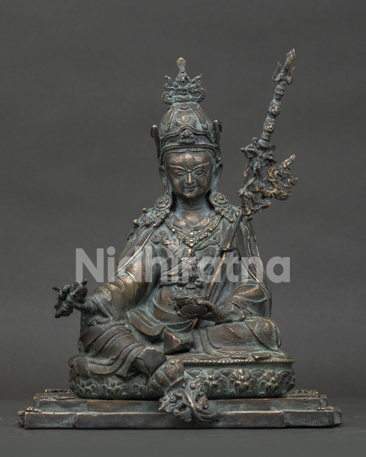 Guru Rinpoche bronze statue from Nepal in Lalitasana posture front view