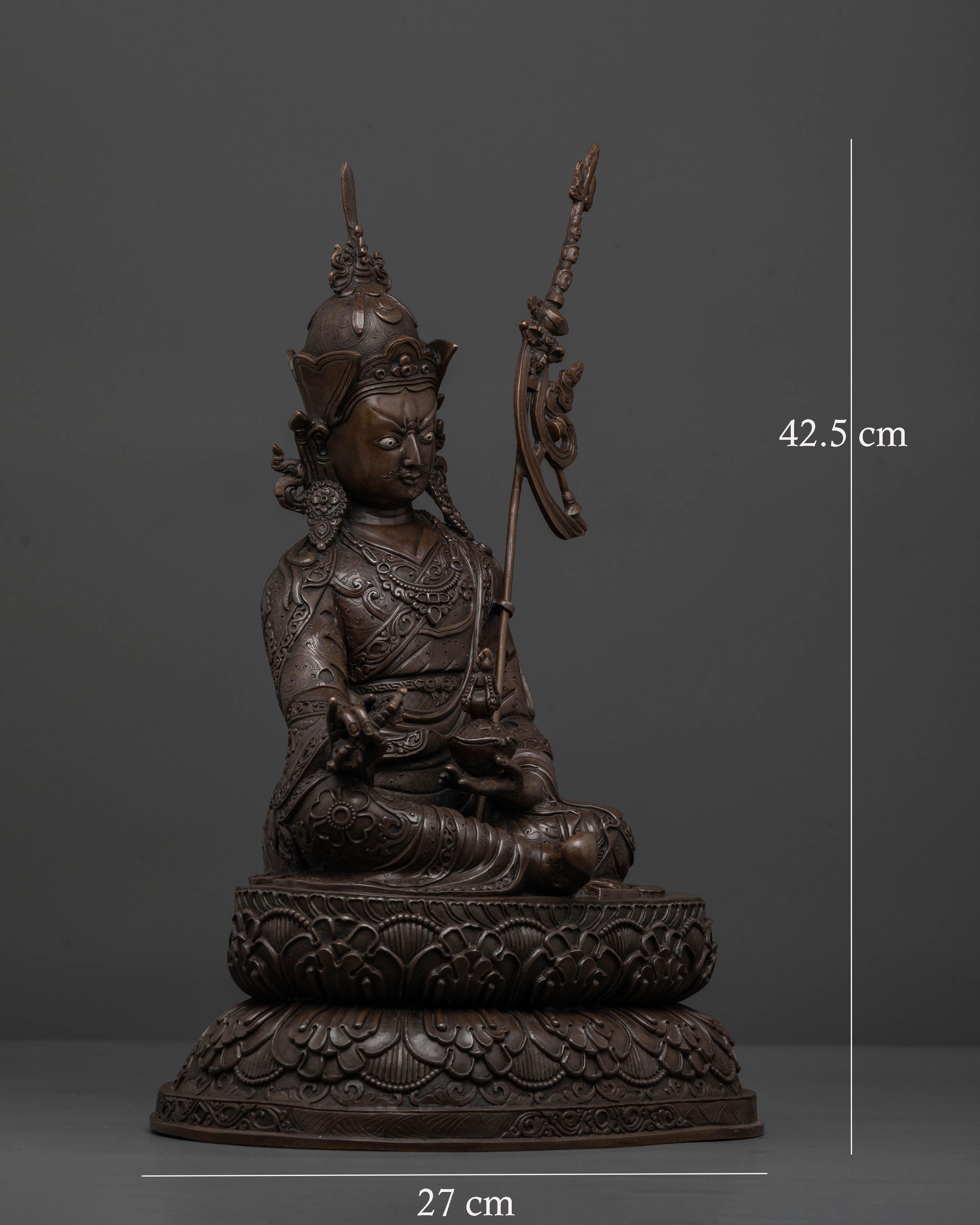 Guru Rinpoche seated on double lotus pedestal holding vajra and skull cup
