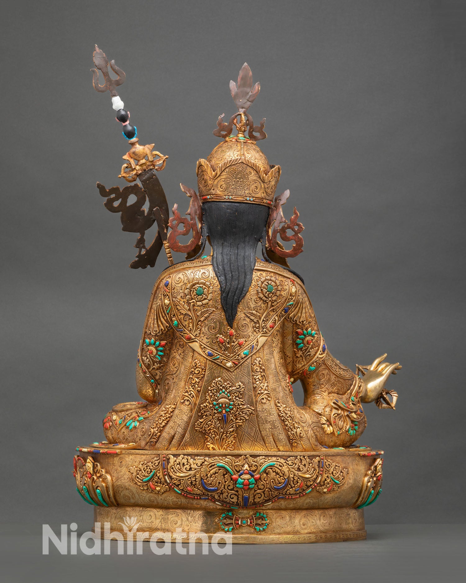 Guru Rinpoche statue back view intricate hand carved copper coral turquoise accents altar meditation decor sculpture