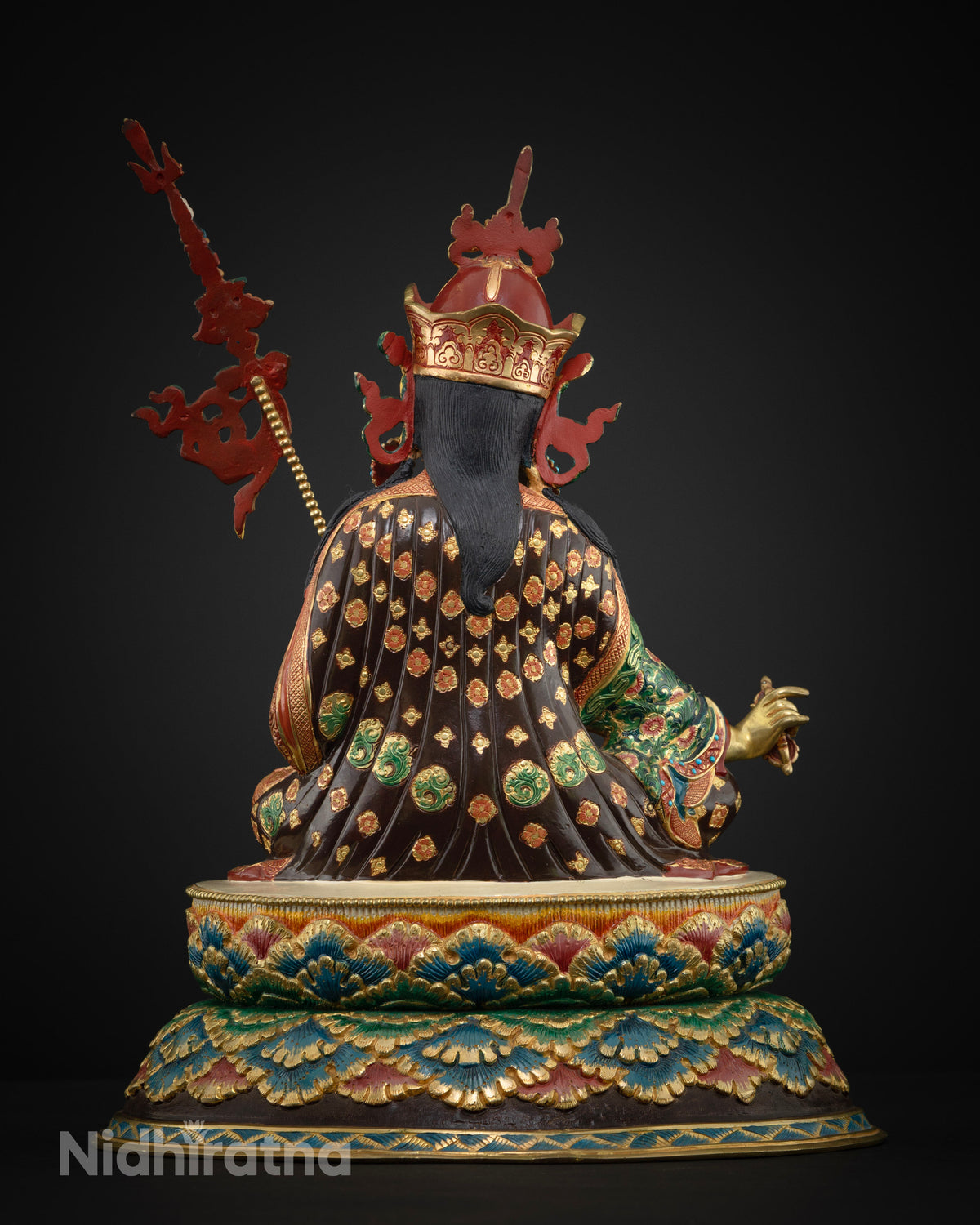 Guru Rinpoche statue back view with hand-carved floral robe, fire-gilded copper, handmade in Nepal