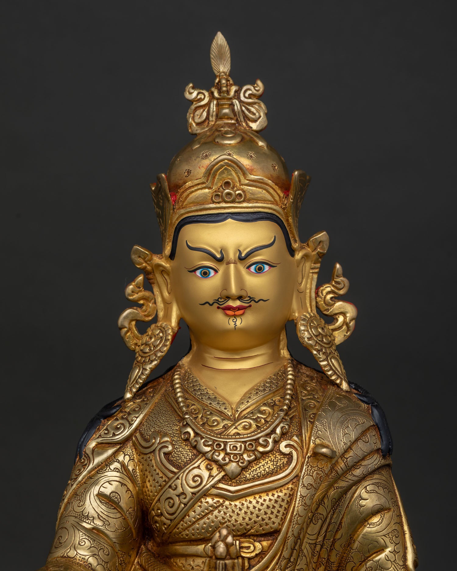 guru rinpoche statue copper sculpture with 24k gold fire gilding close up