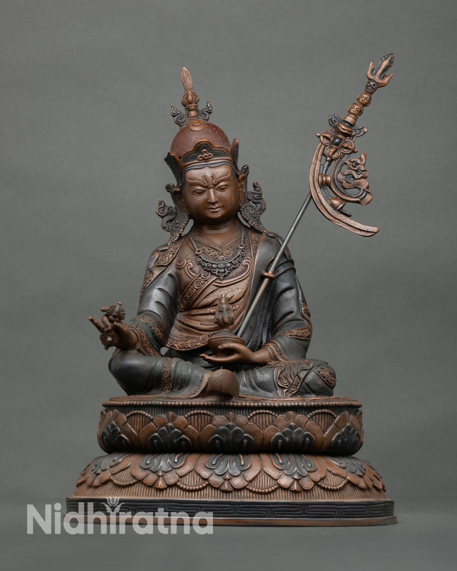 Guru Rinpoche statue front view lotus throne oxidized copper Buddhist deity Nepal Newari craft