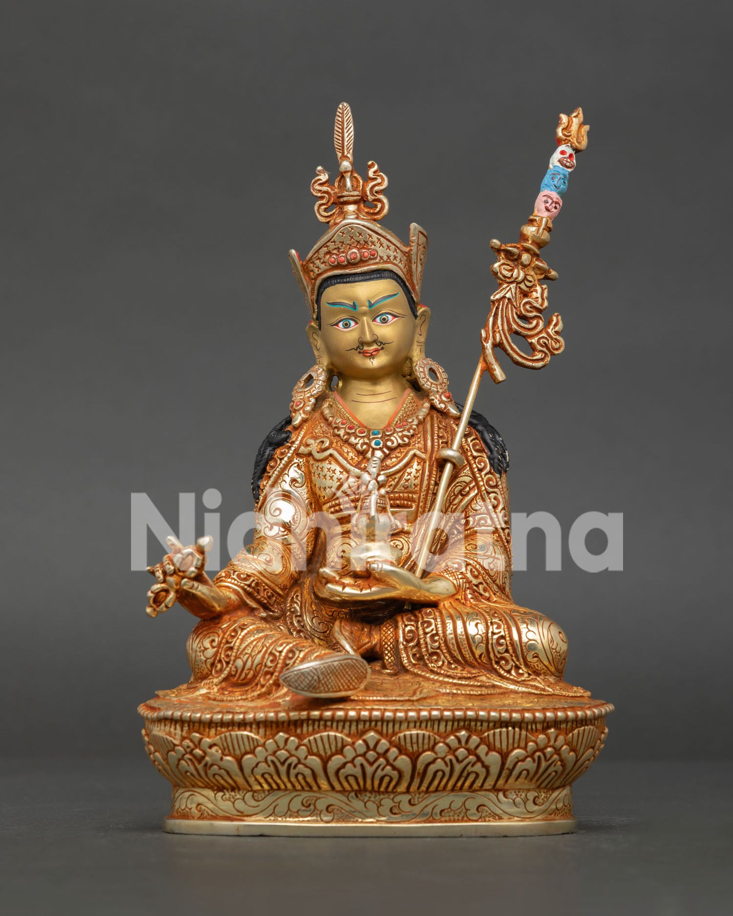Guru Rinpoche statue, handcrafted from copper with gold gilding and gold painted face in Nepal