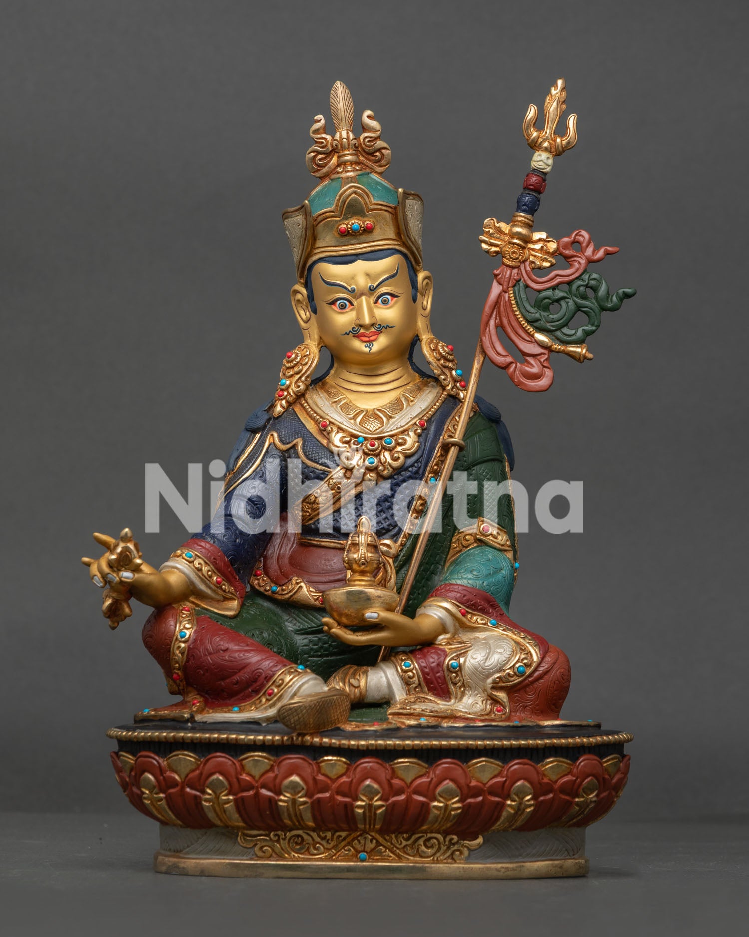 Guru Rinpoche Statue handcrafted in Nepal front view with gold-painted face and lotus throne