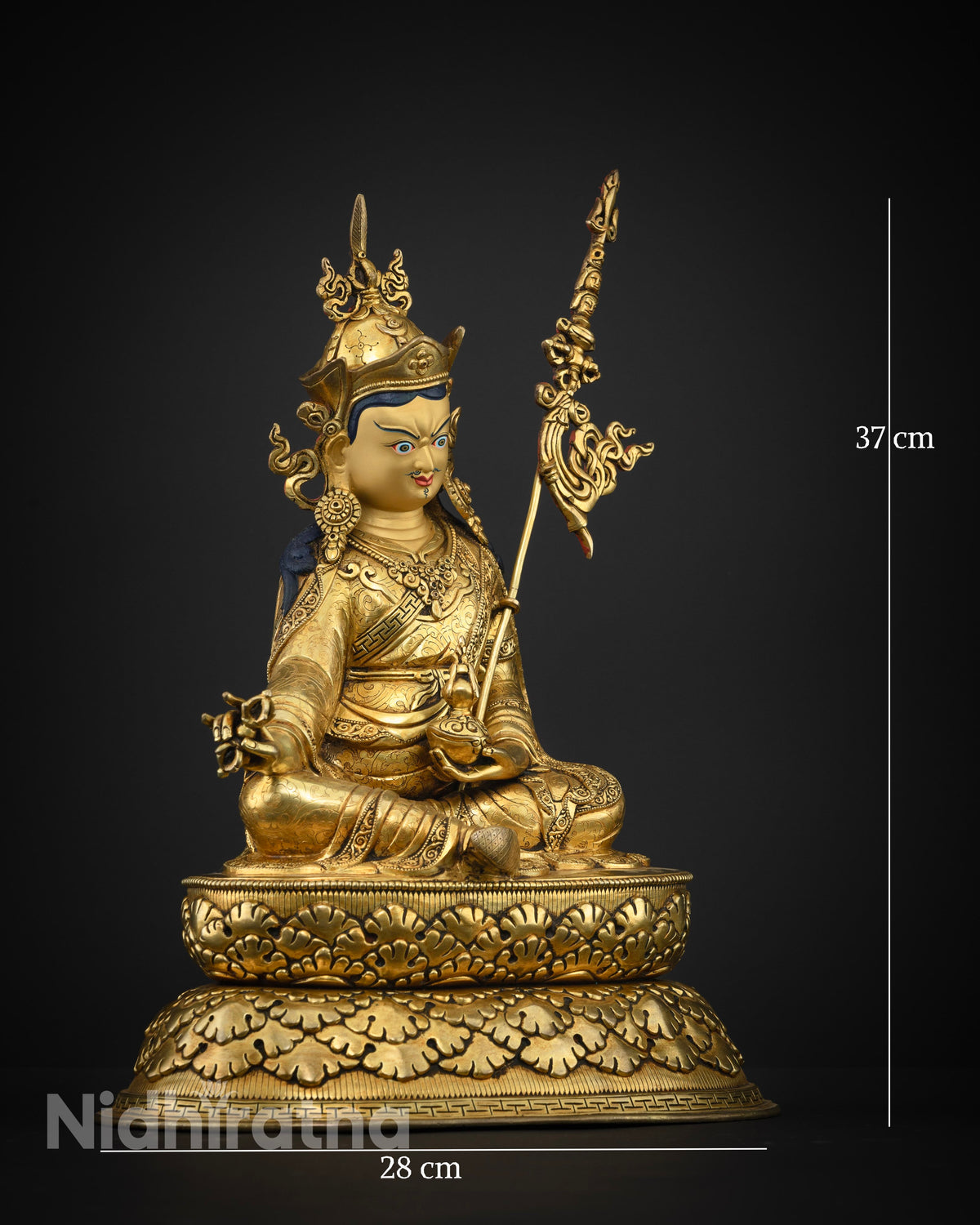 Guru Rinpoche statue royal ease posture right side view.