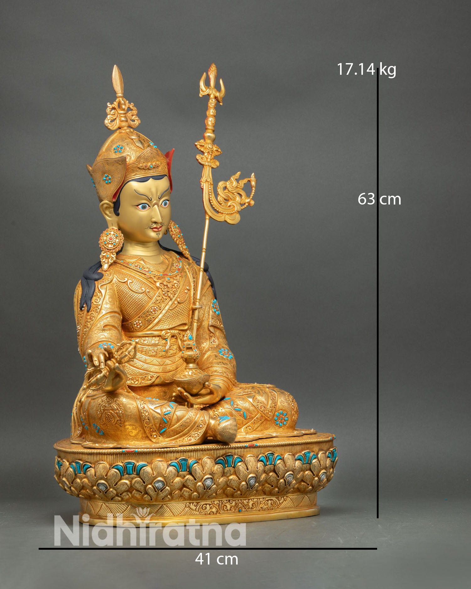 Guru Rinpoche statue side view vajra skull cup trident Tibetan Buddhist art Nepal