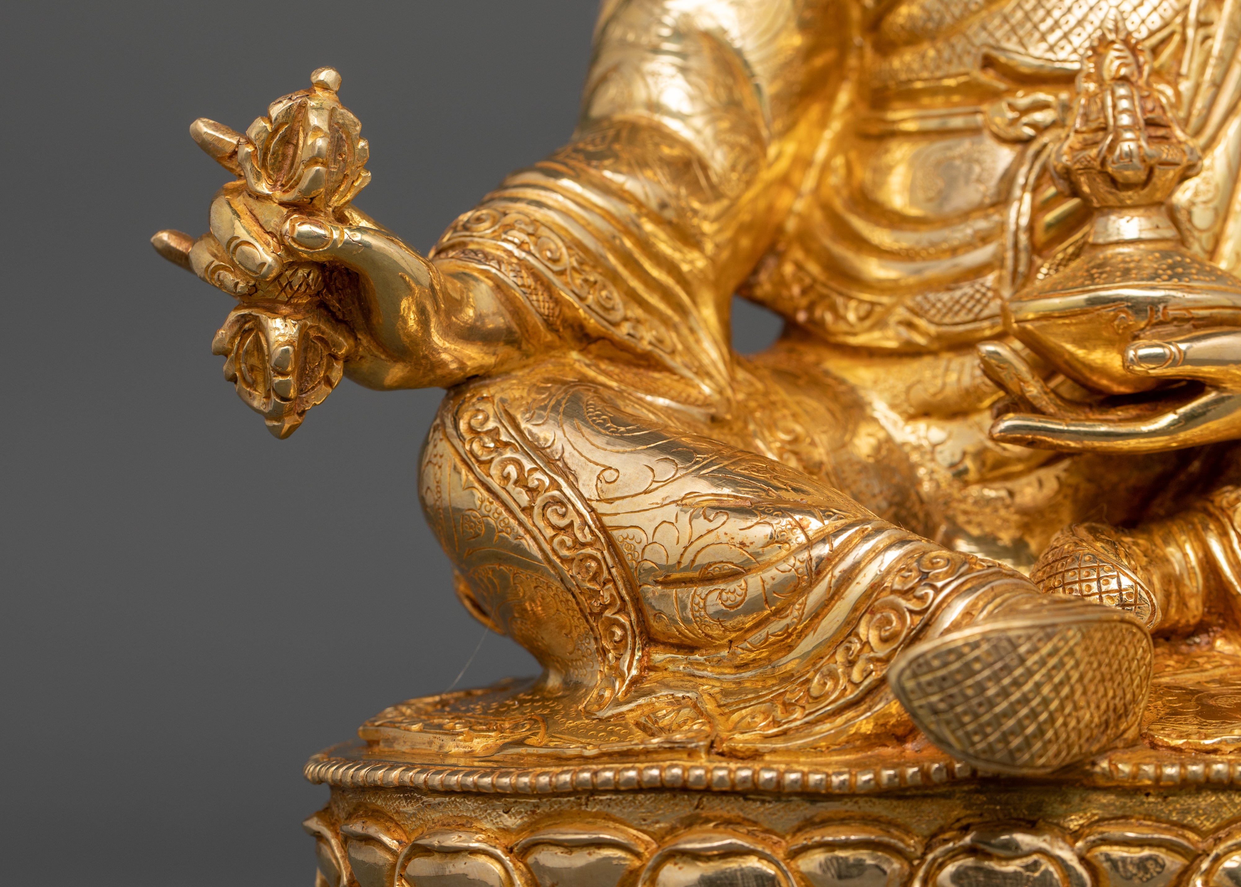 the ready to step forward leg of statue of guru rinpoche