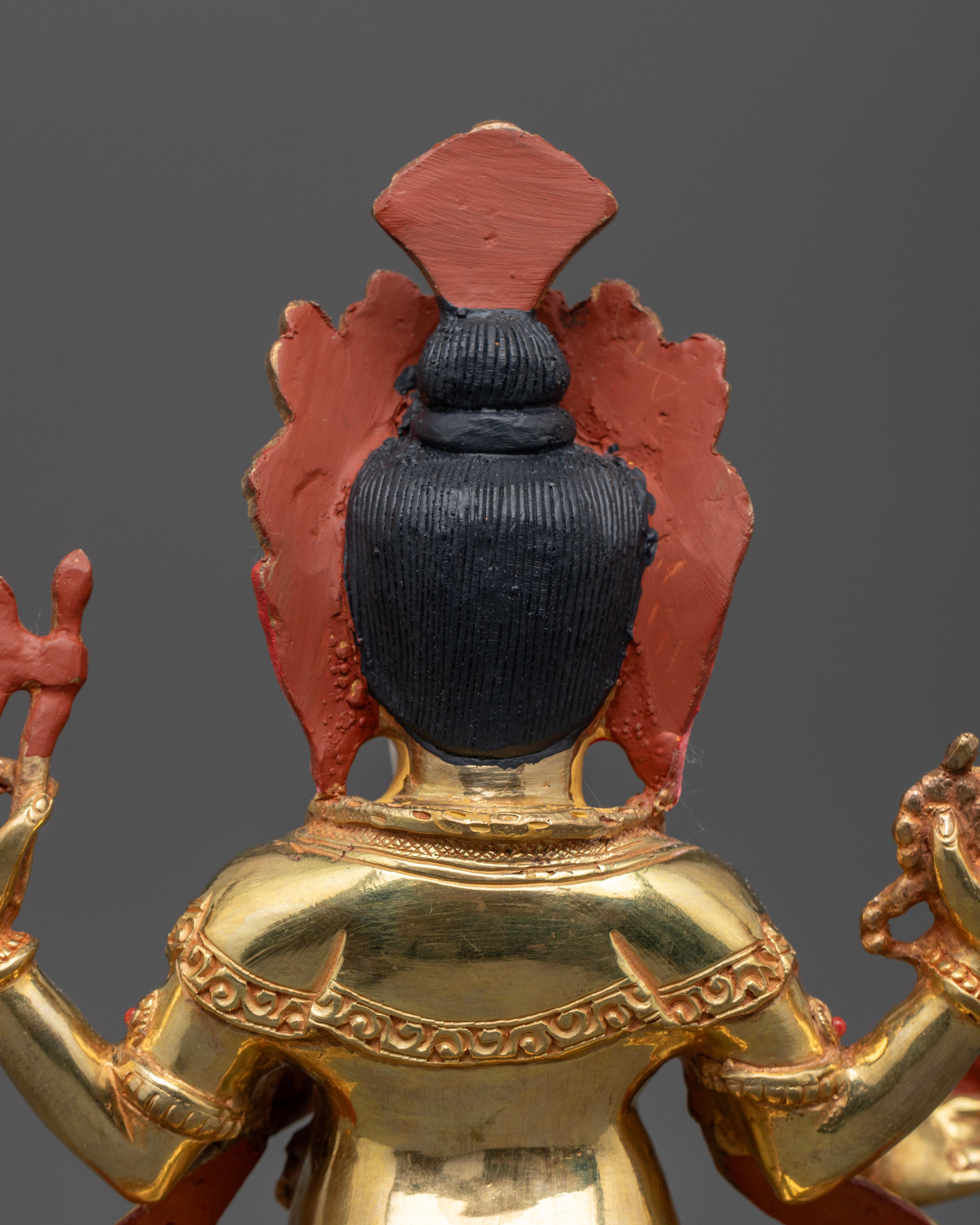 acrylic painted hair of golden ganesh statue