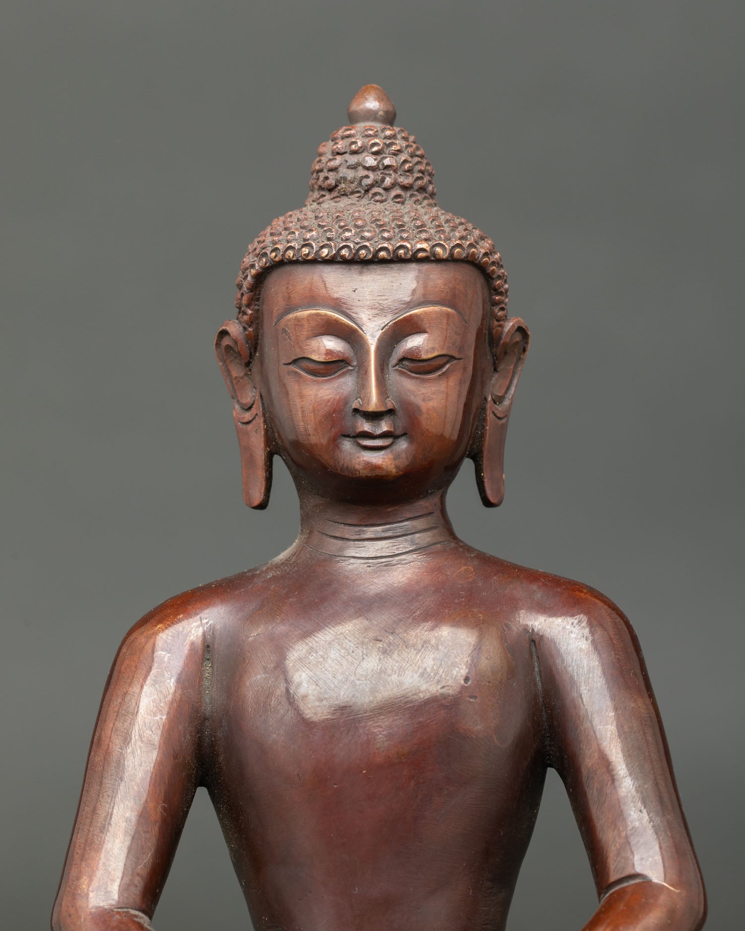 Handcrafted Amitabha Buddha Statue with Alms Bowl Oxidized Copper Close Up.