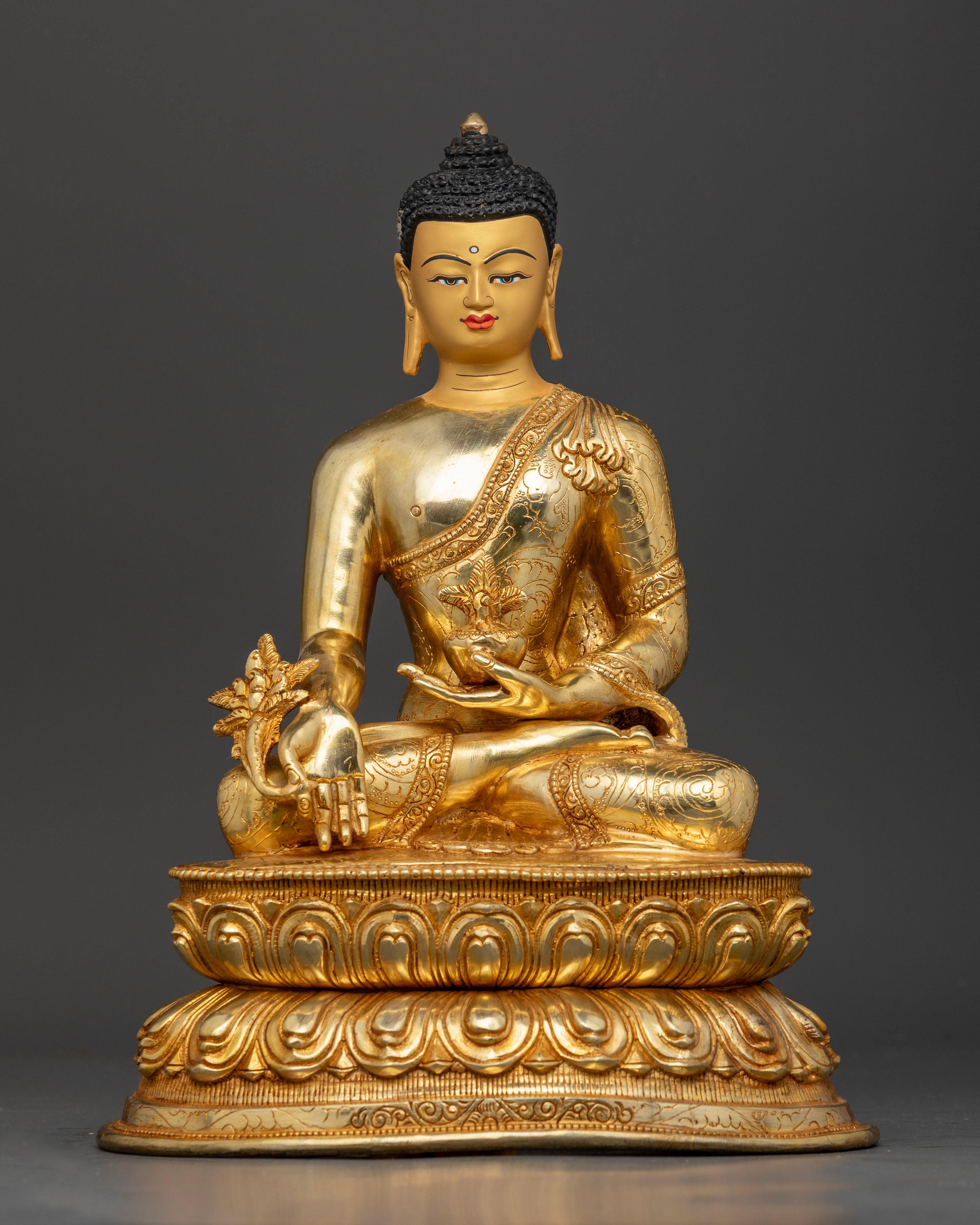 Handcrafted Bhaisajyaguru statue seated on a double lotus pedestal with intricate details