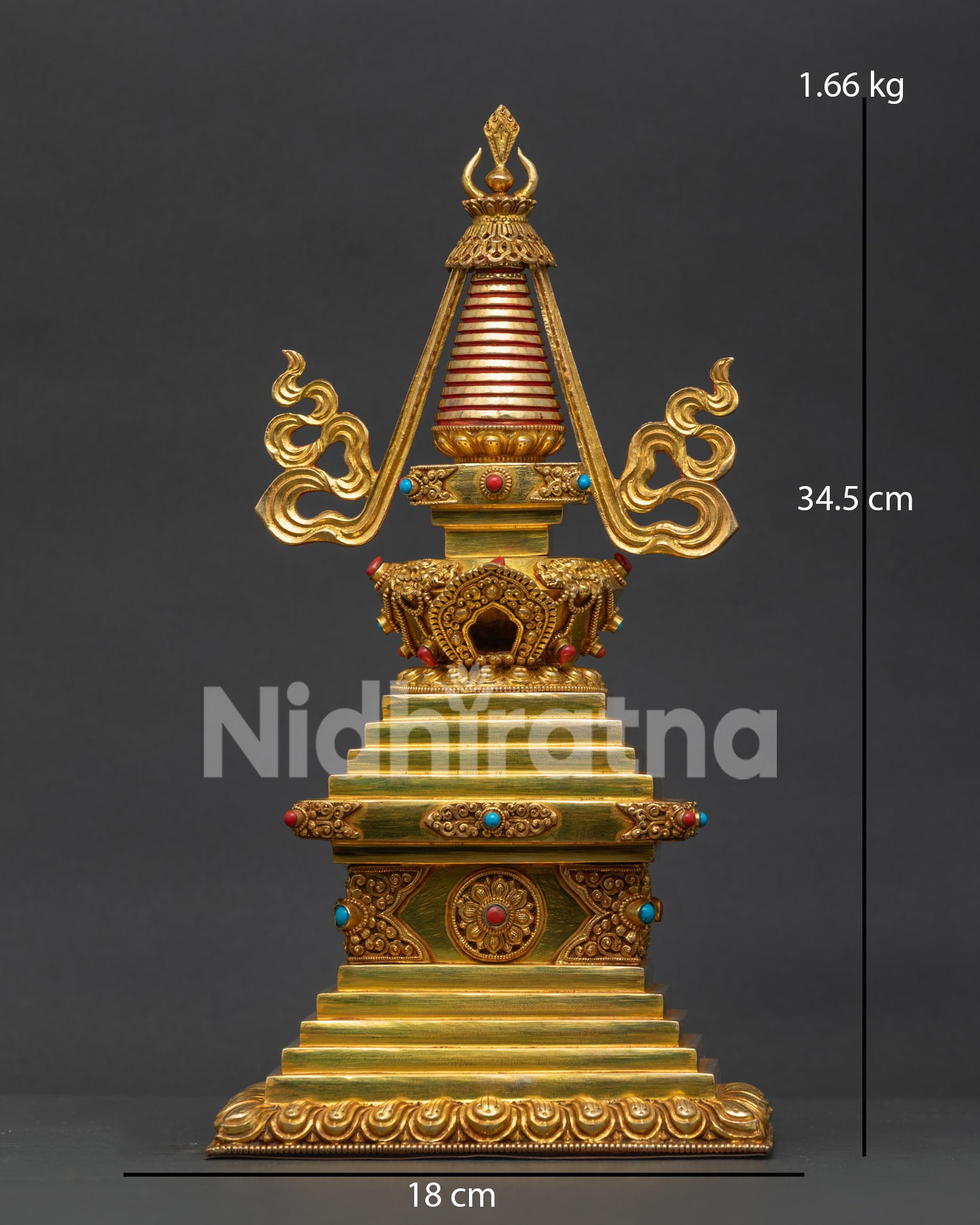 Handcrafted Buddhist Stupa with gold plated copper and semi precious stone decoration from Nepal
