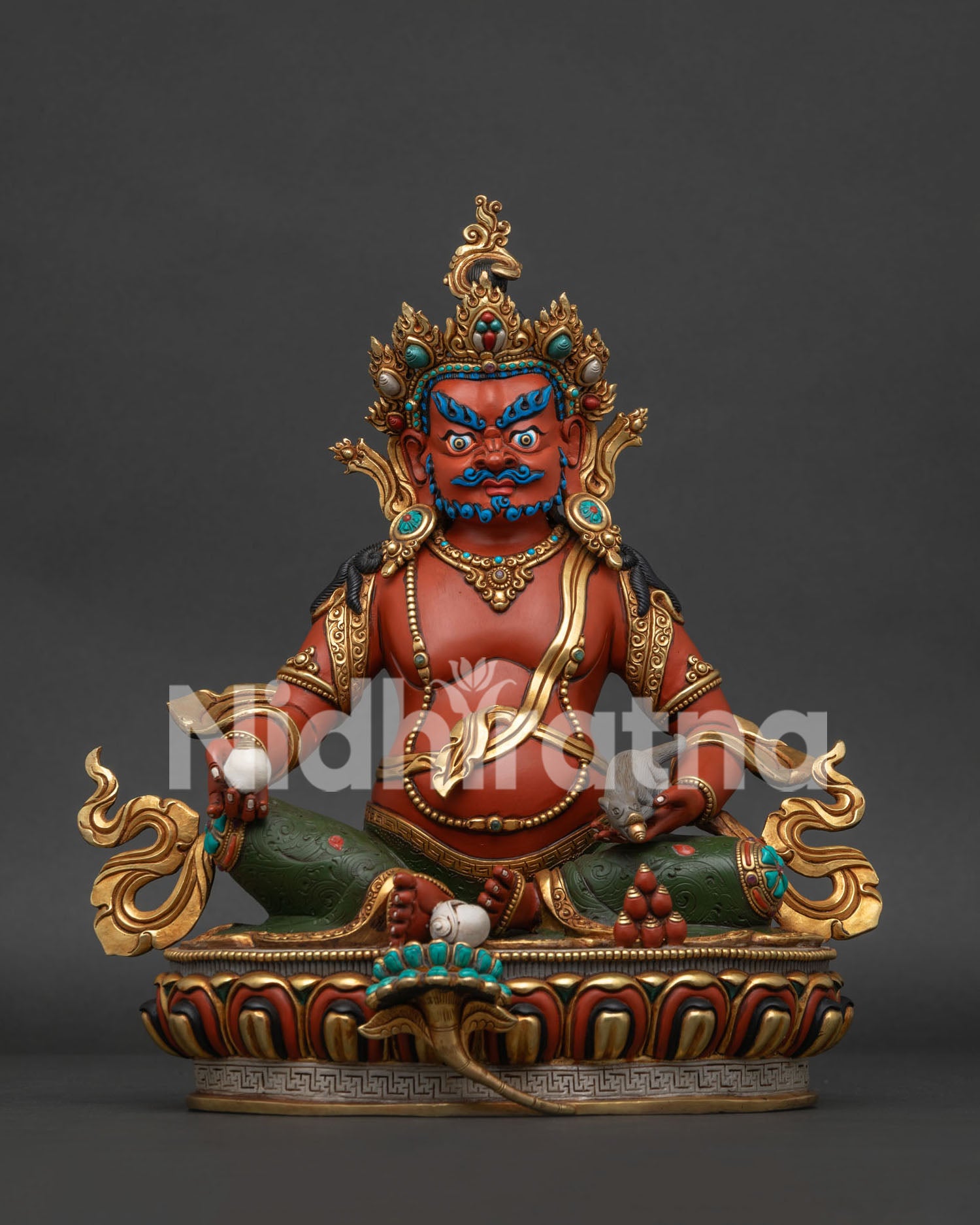 Handcrafted Dzambhala statue with gold gilding, turquoise crown, and jewel mongoose on lotus base.