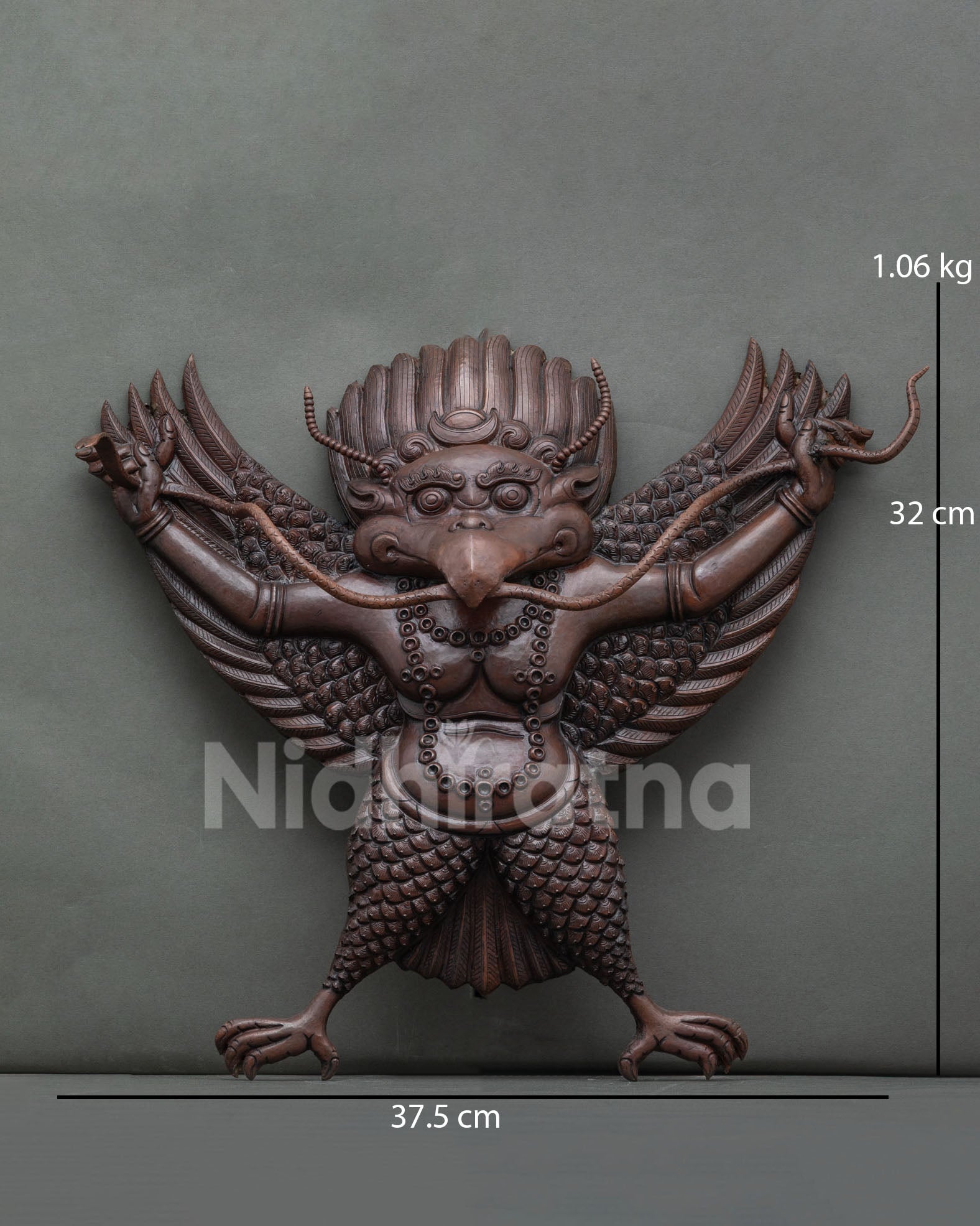 Handcrafted Garuda wall hanging in copper with rich oxidized finish from Nepal