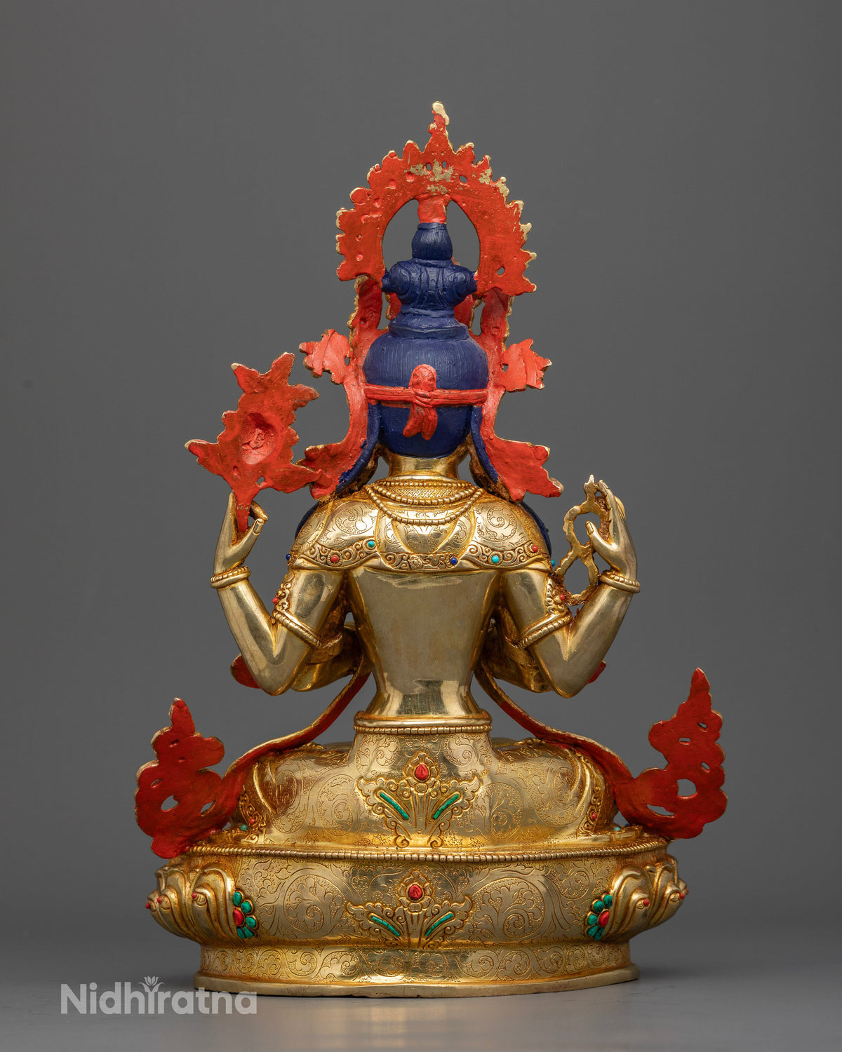 Handcrafted gold-gilded Chenrezig statue seated on lotus pedestal for Buddhist altar, meditation, and prayer.