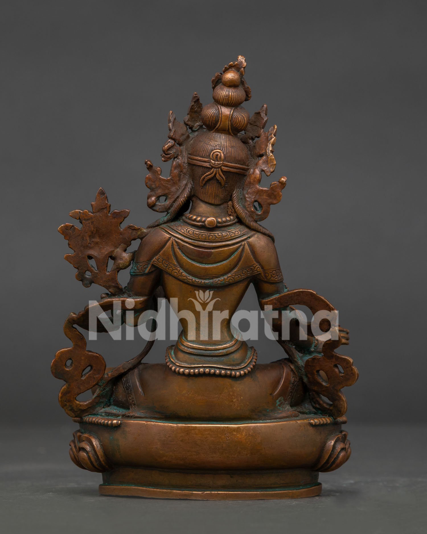 Handcrafted Green Tara statue back view showing intricate Newari copper craftsmanship.